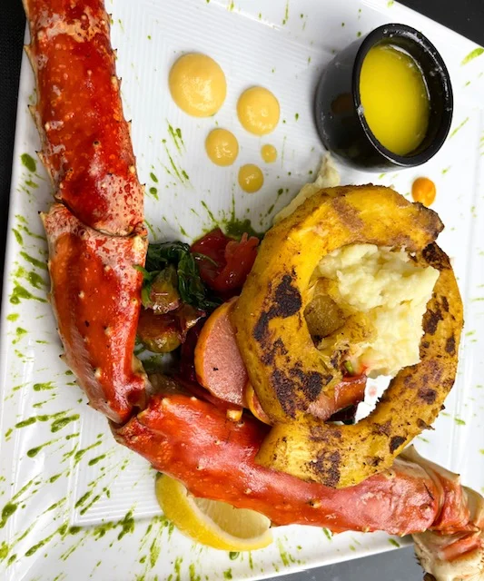 Grilled lobster tail with seasonal vegetables