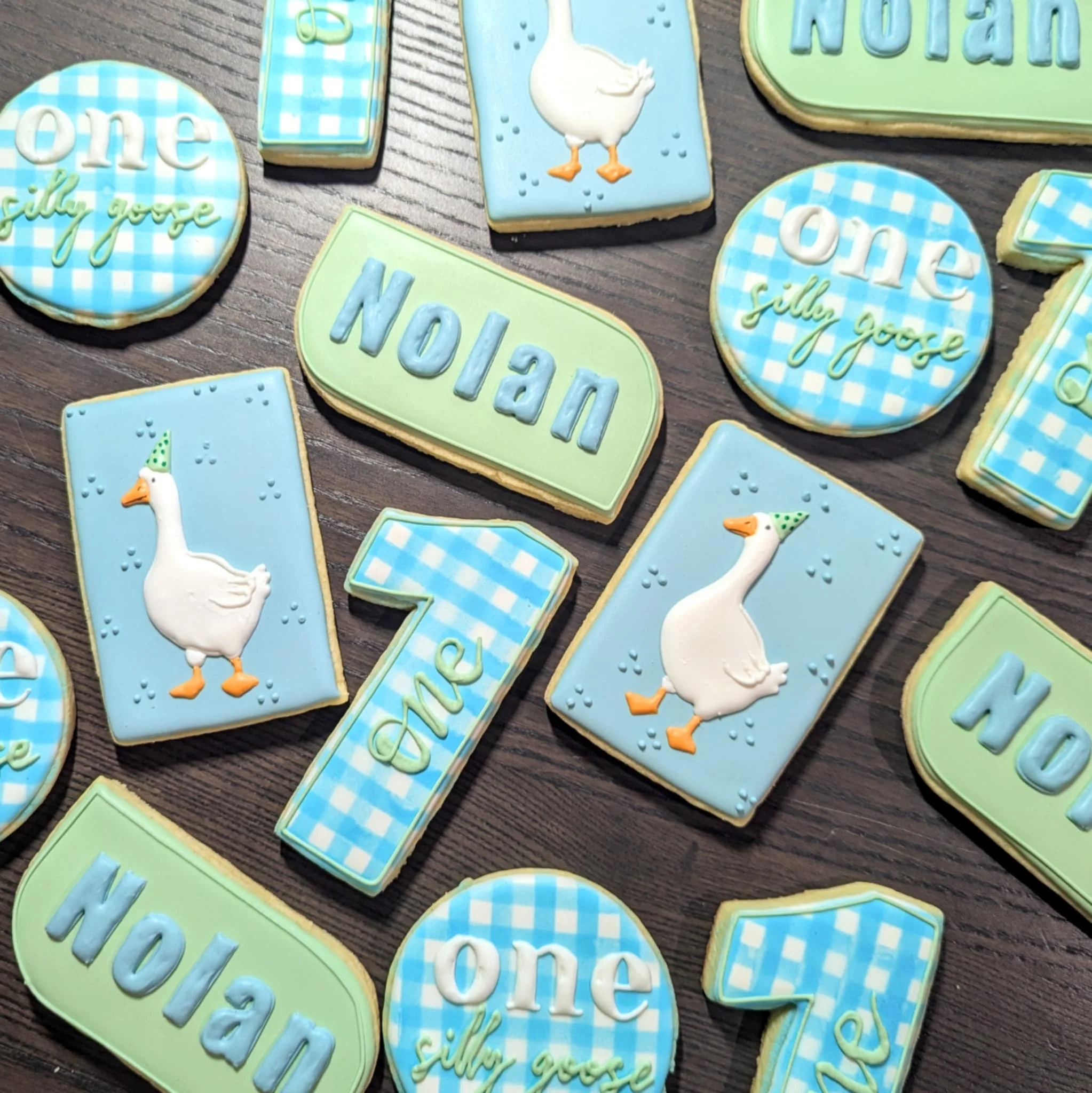 Decorative cookies for a child's birthday featuring a goose theme