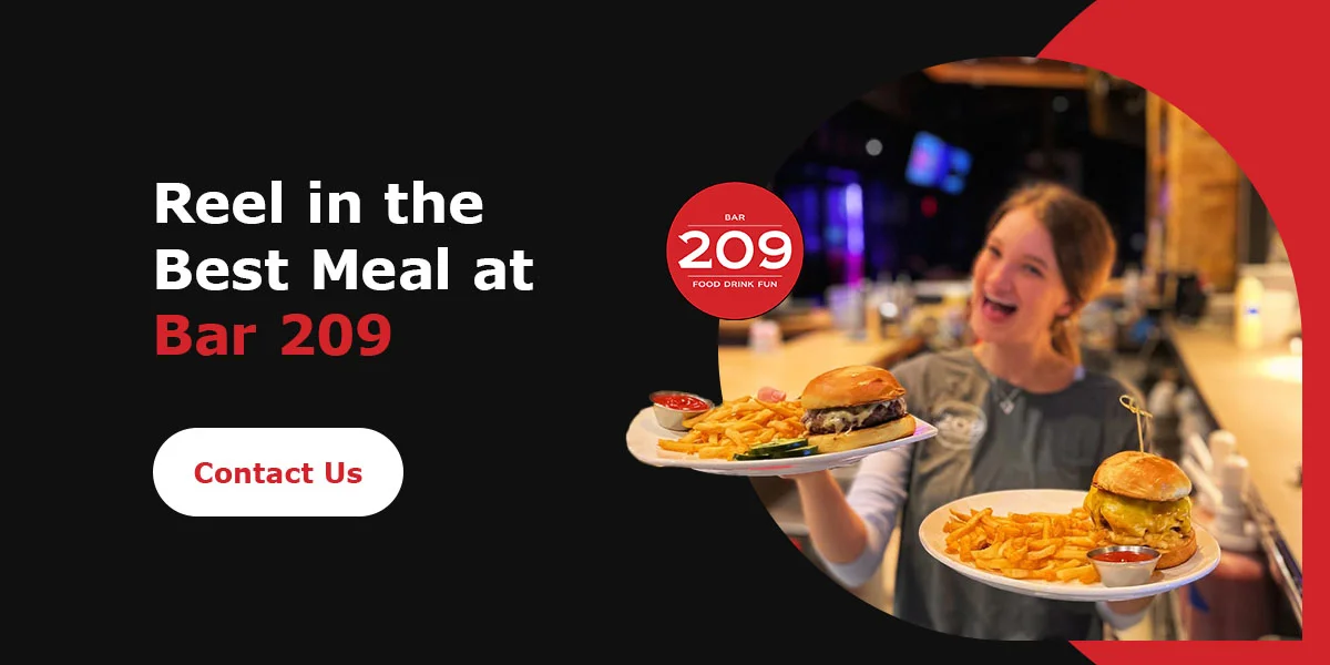Smiling server presenting gourmet burgers with fries at Bar 209