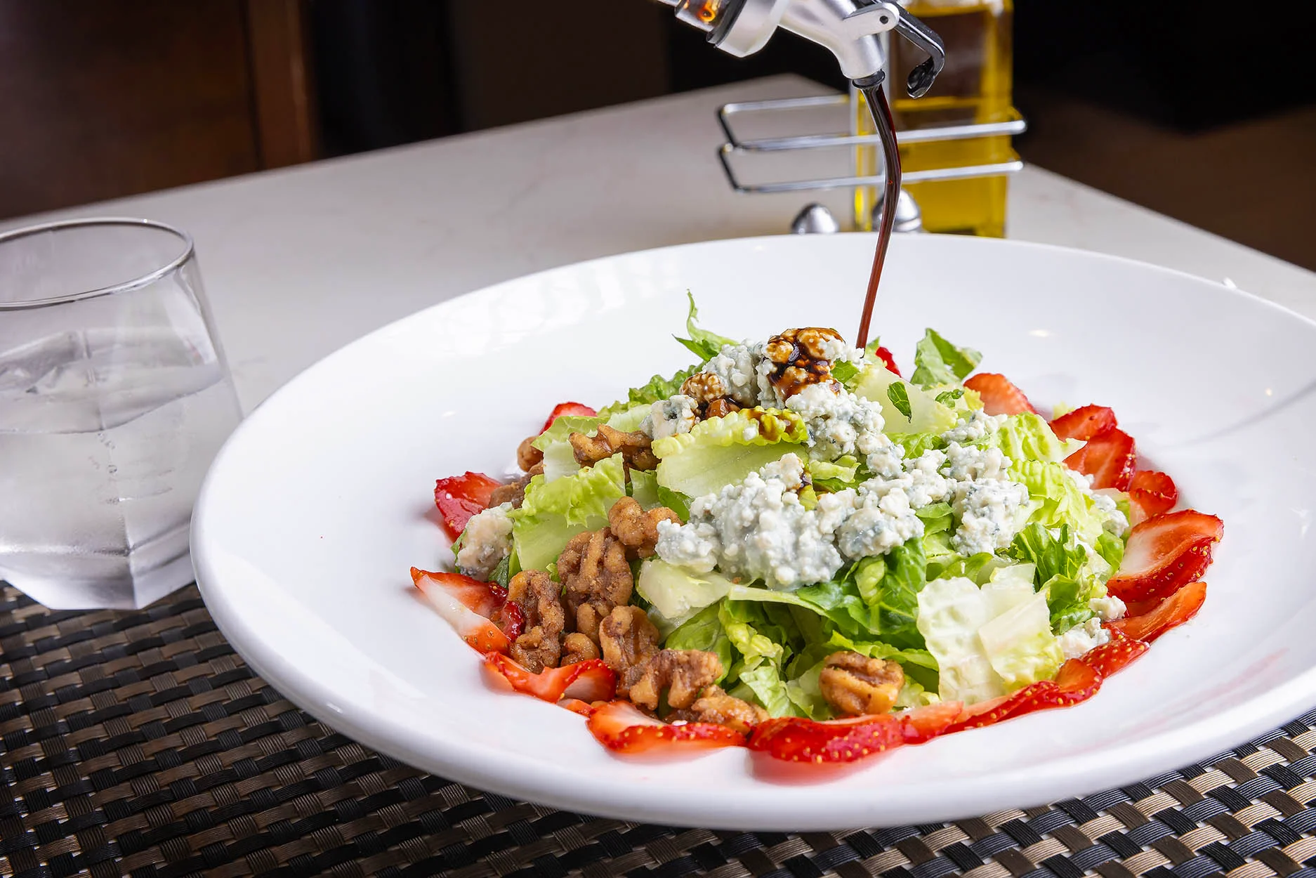 Cucina salad dropped with feta cheese and vinegar