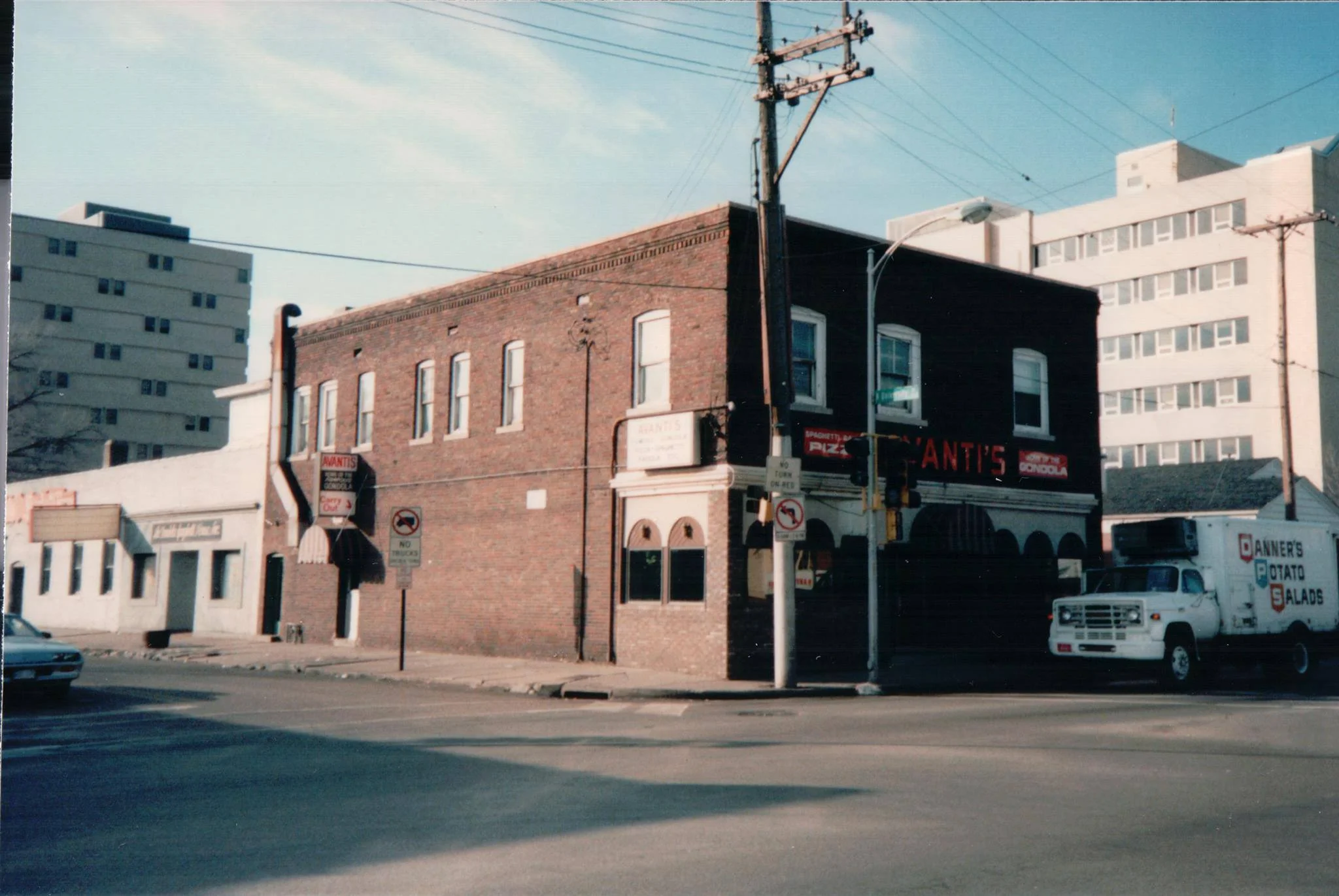 Historic restaurant exterior with brick facade and signage