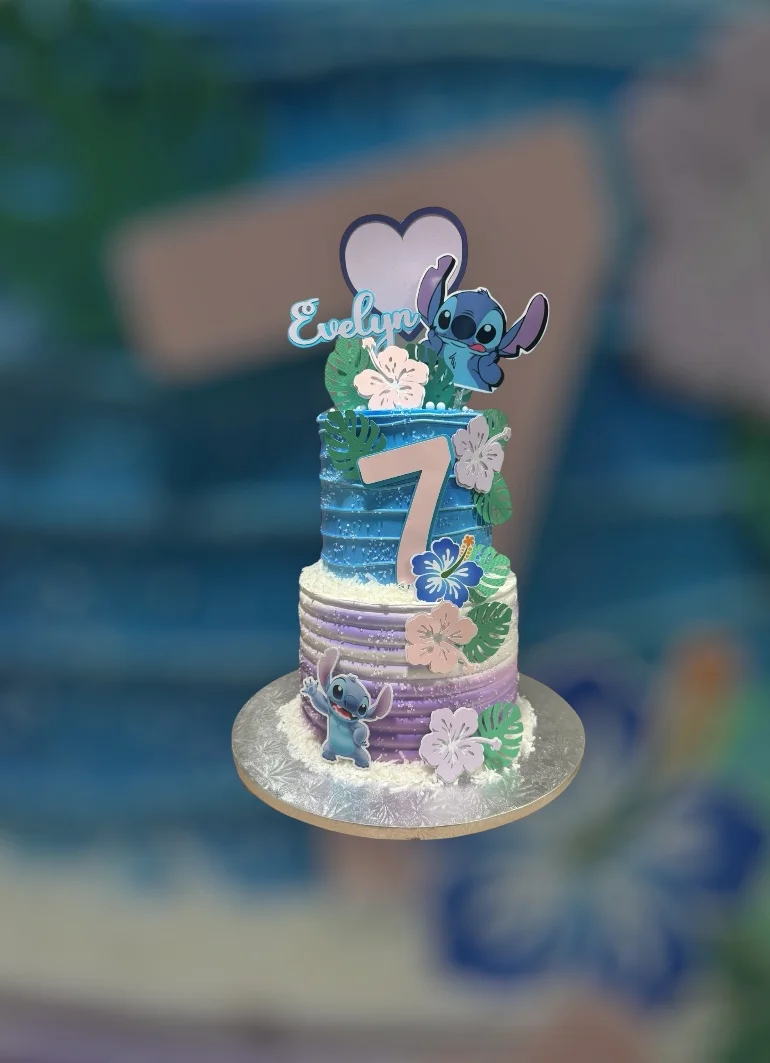 Colorful birthday cake with Stitch character and floral decorations