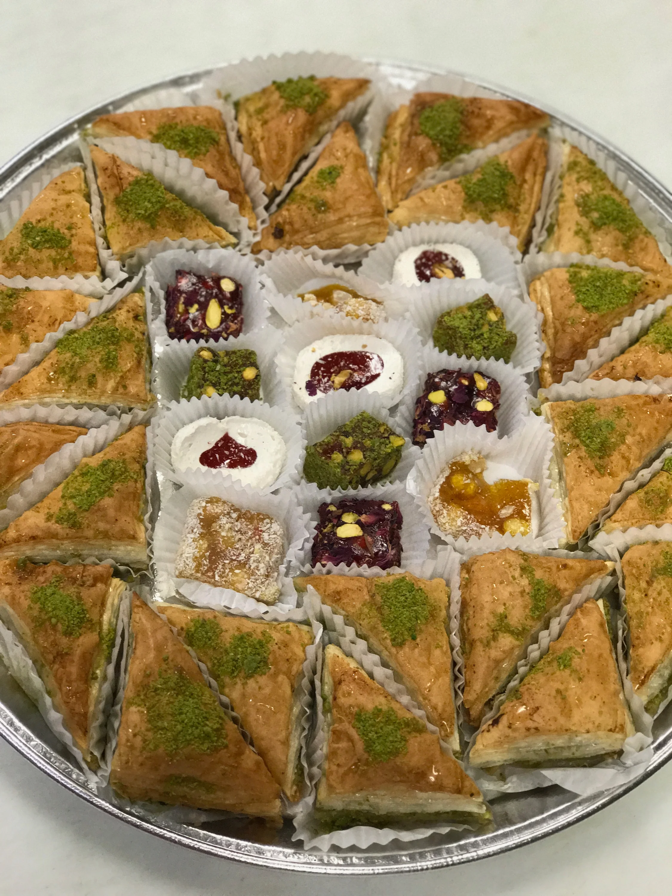 Assorted Middle Eastern sweets including baklava and Turkish delight