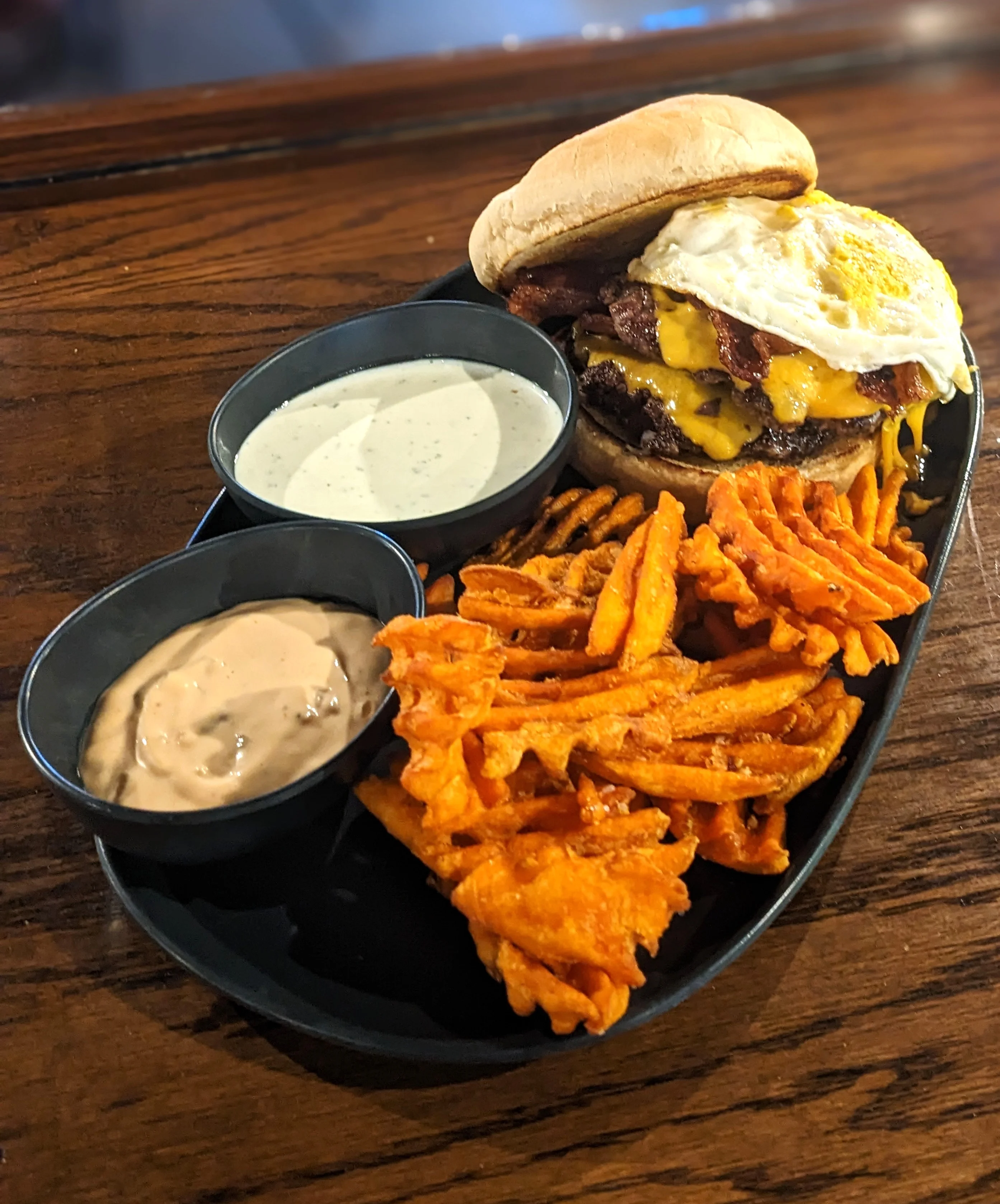 Smashed breakfast burger with sweet potato fries