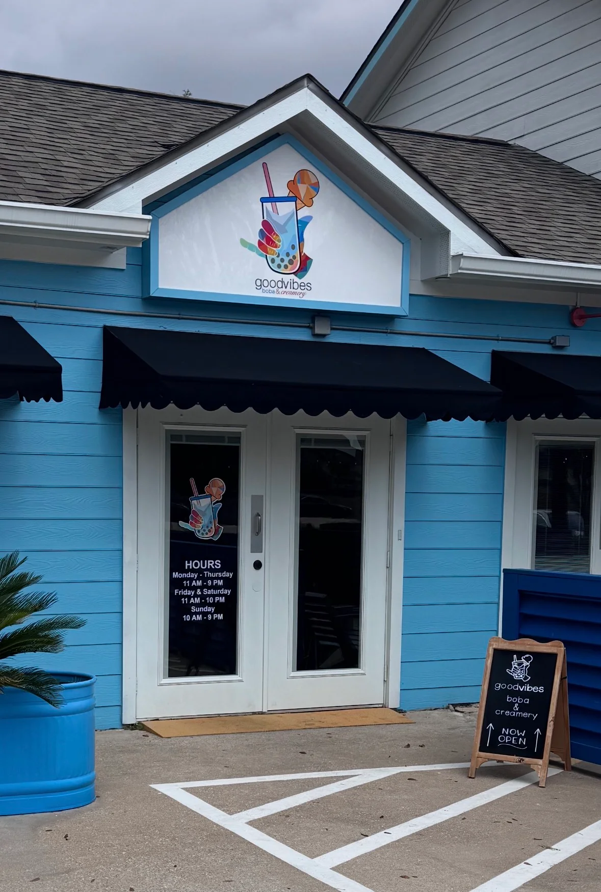 Exterior of Good Vibes Boba & Creamery with colorful signage
