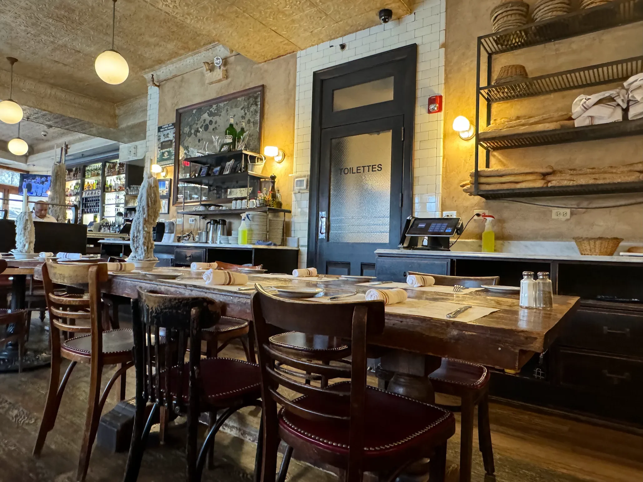 Charming restaurant interior with rustic decor and warm lighting