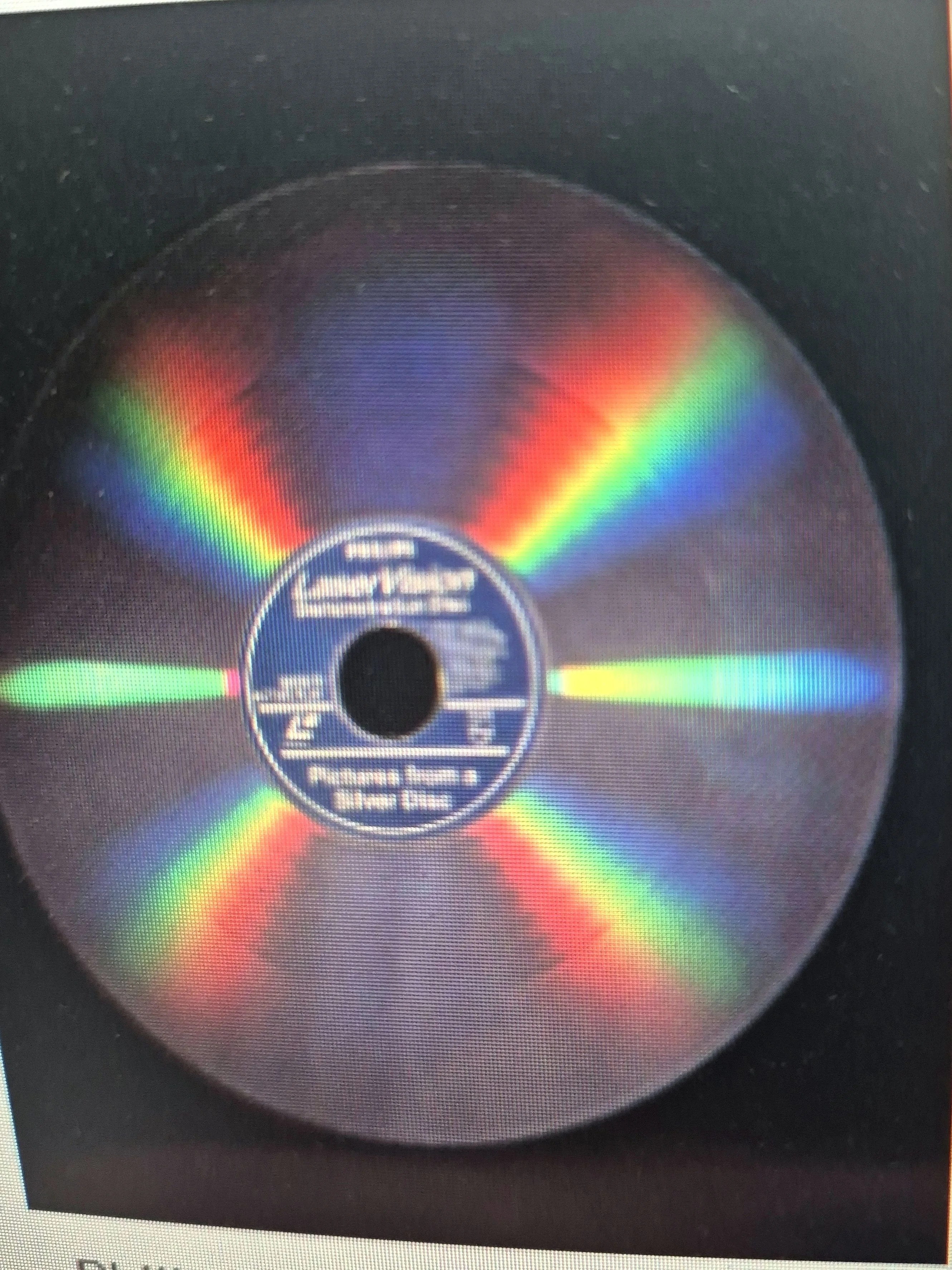 Colorful laser disc with rainbow reflections