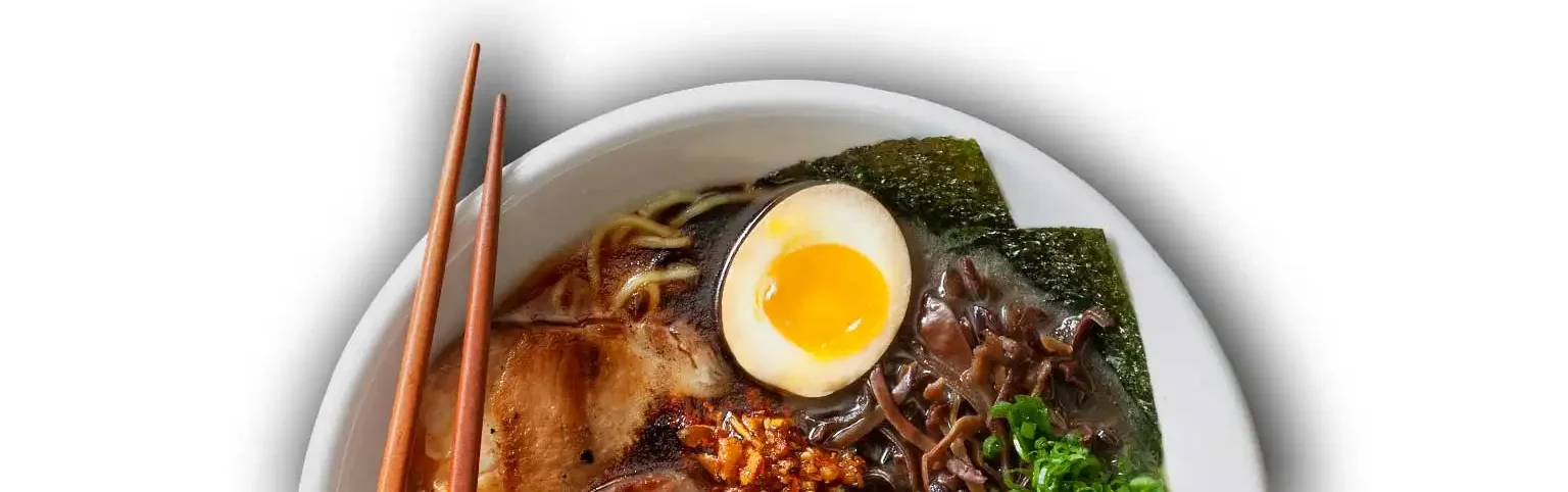 Japanese shoyu ramen with soft-boiled egg and seaweed