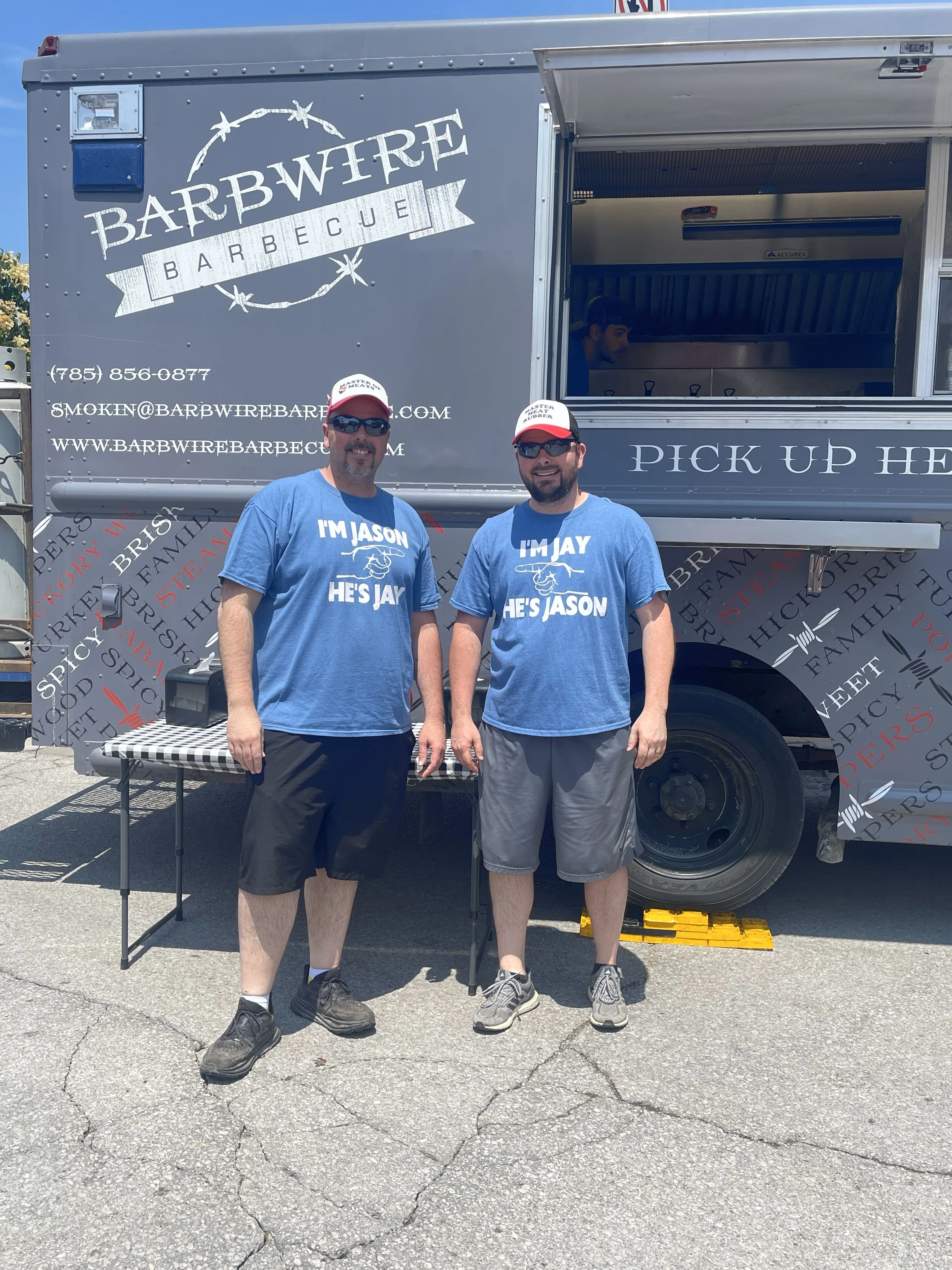 Picture of the twins in front of the food truck