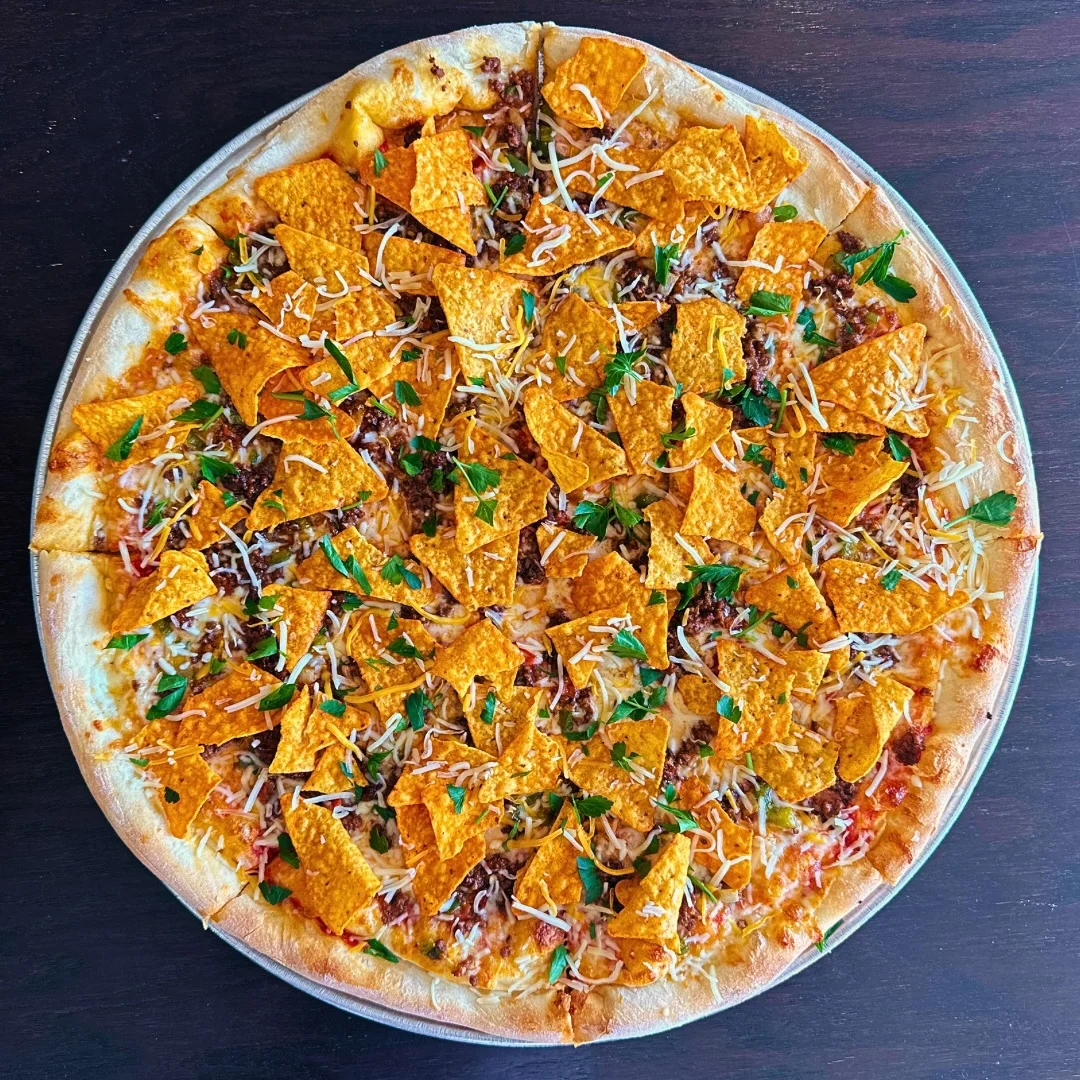 Loaded nacho pizza with crispy tortilla chips