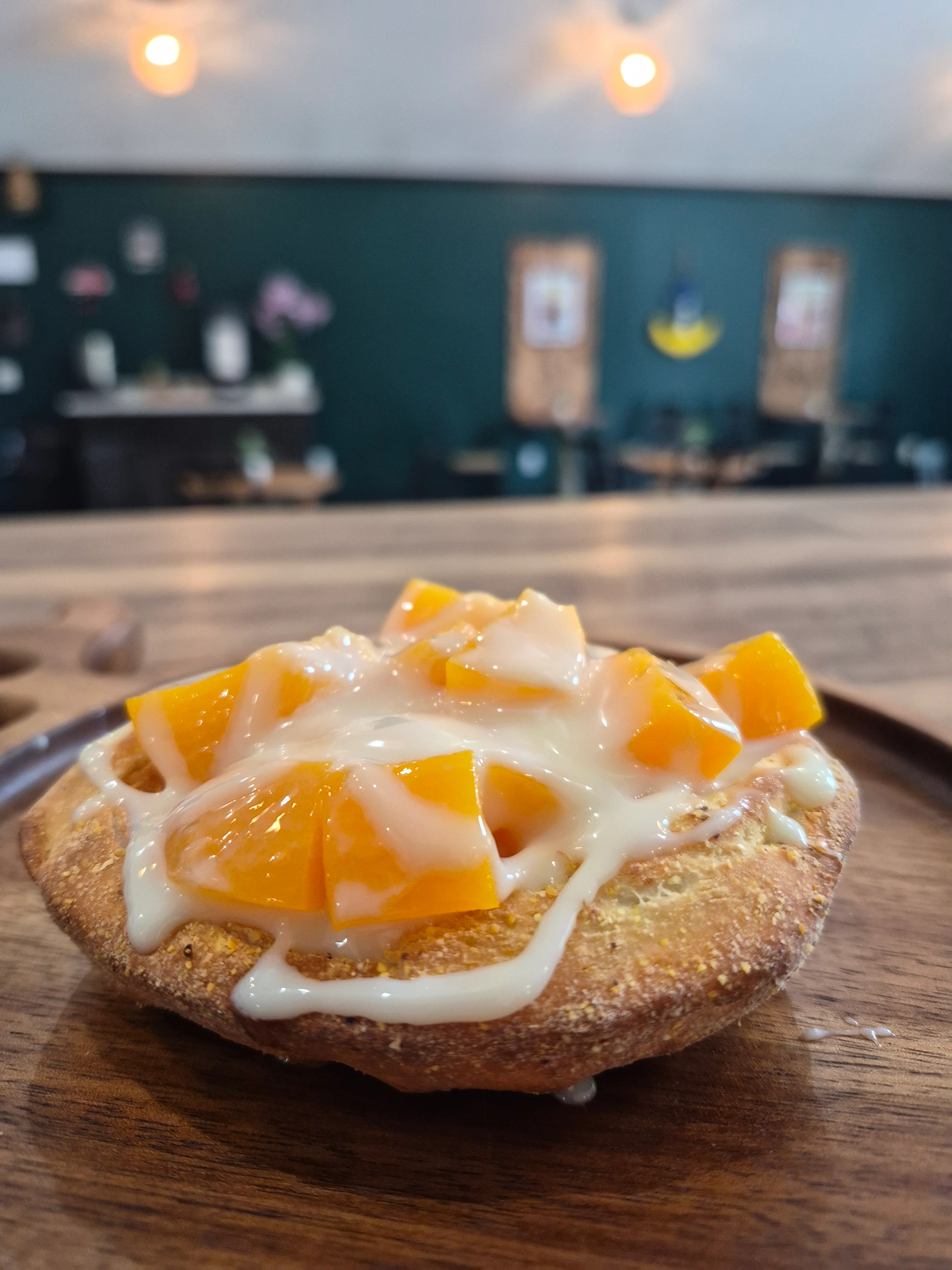 Delicious mango tart with creamy drizzle
