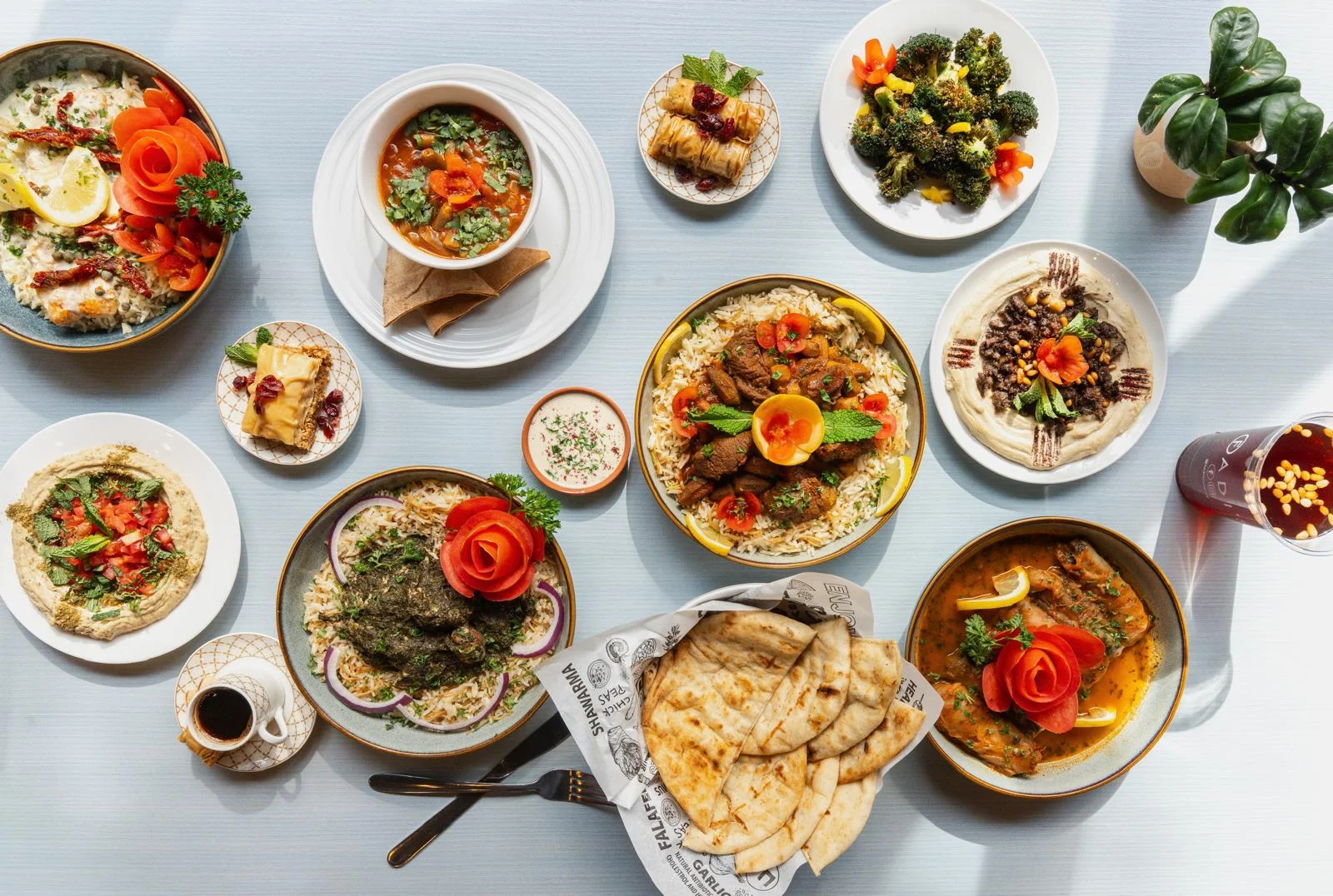 Assorted Middle Eastern dishes including kebabs and hummus