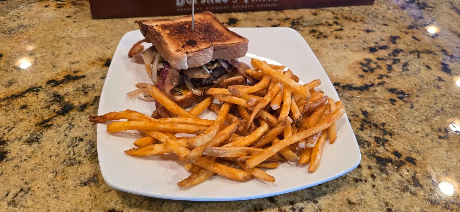 Classic American cheeseburger with fries