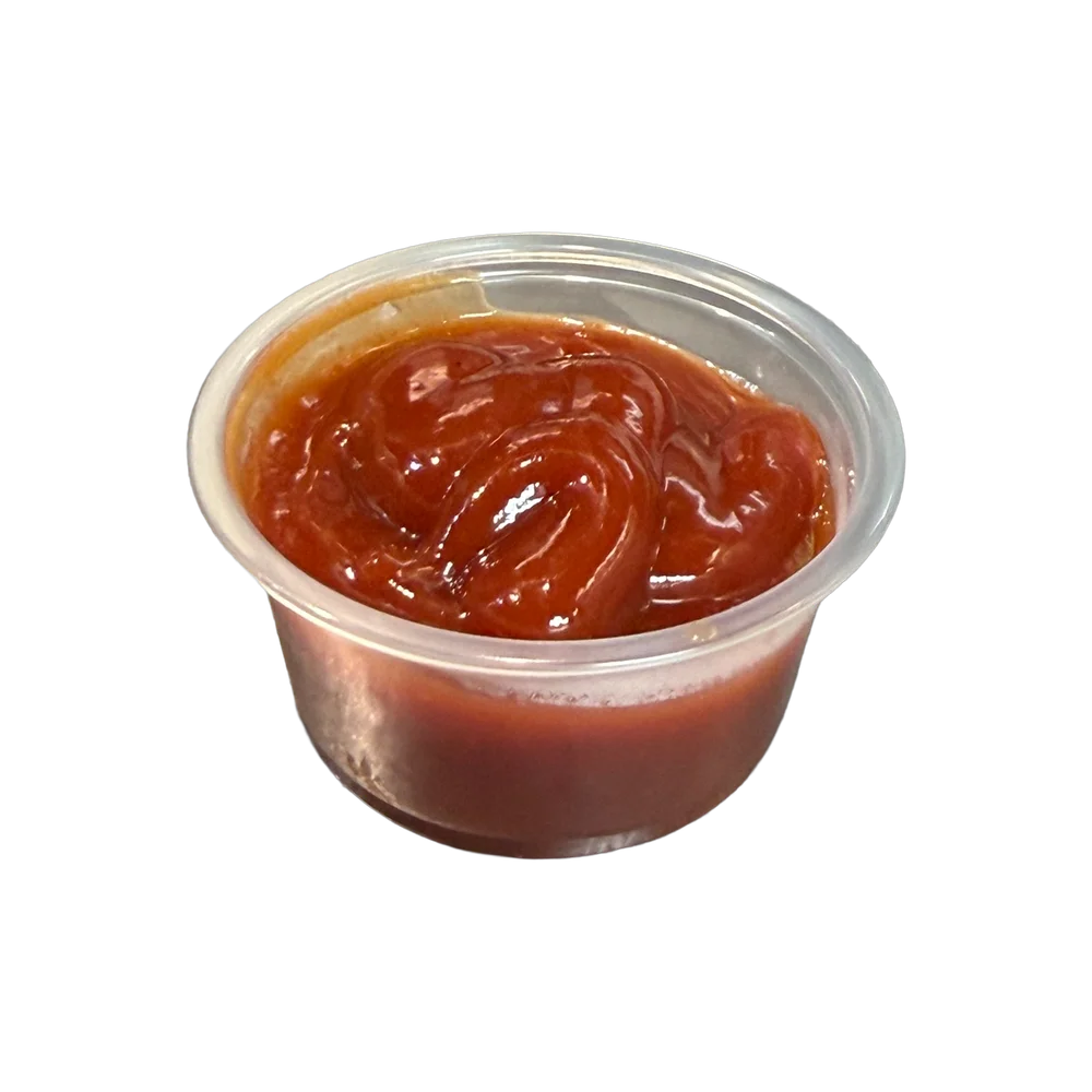 Cup of house BBQ dipping sauce at Hayes Burger