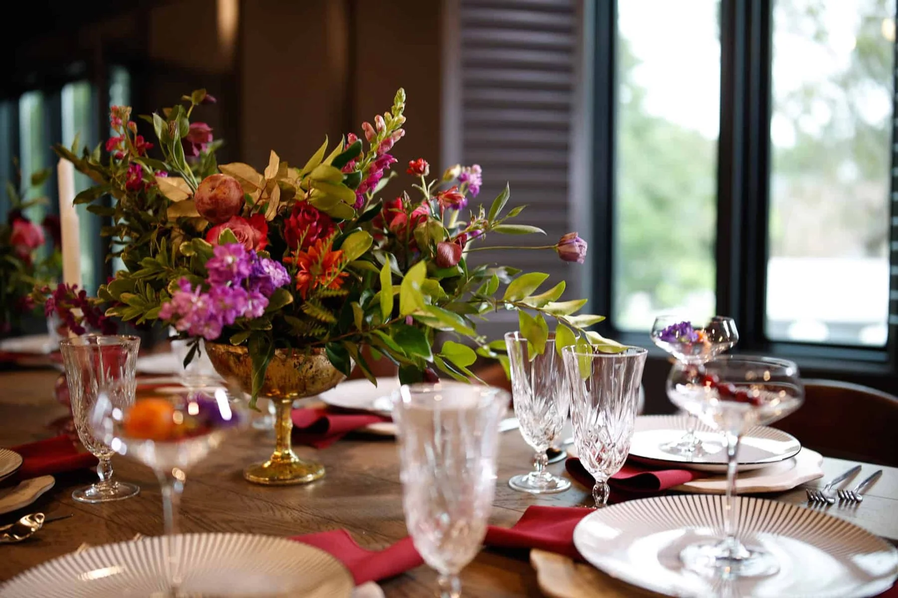 Floral tablescape set for a private dinner in the Embers Room at Firetender