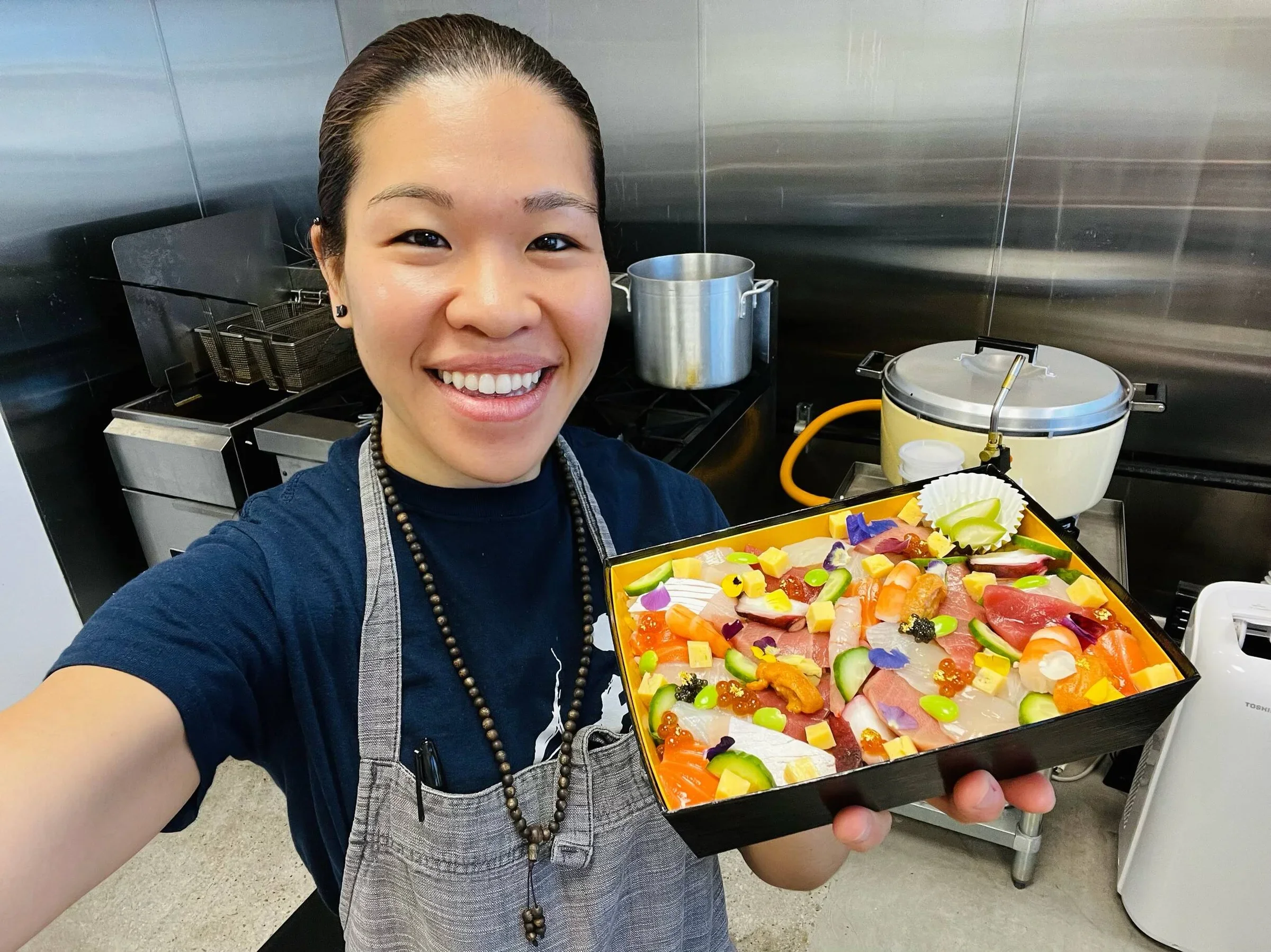 Colorful Japanese chirashi sushi platter with fresh seafood