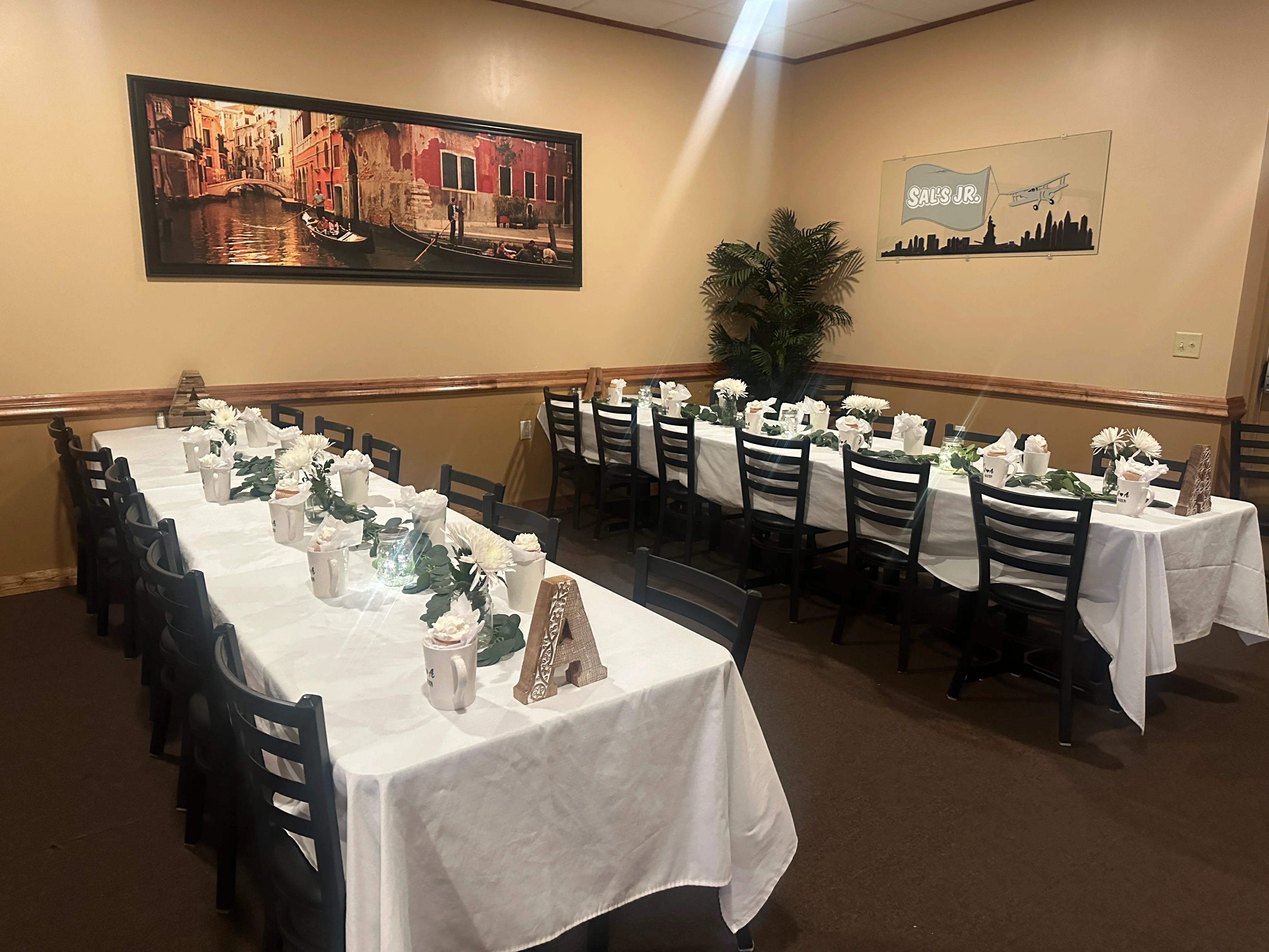 Elegant dining setup in a cozy restaurant with floral decor