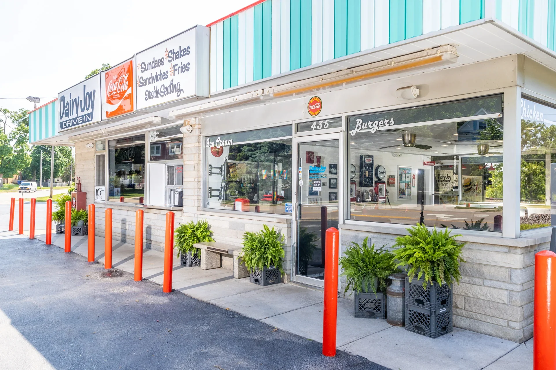 Classic drive-in restaurant exterior with colorful signage