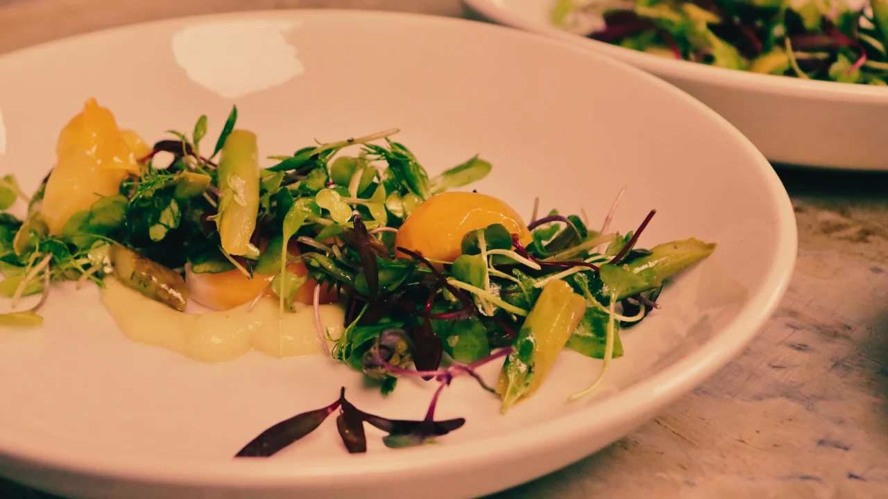 A restaurant chef preparing a dish