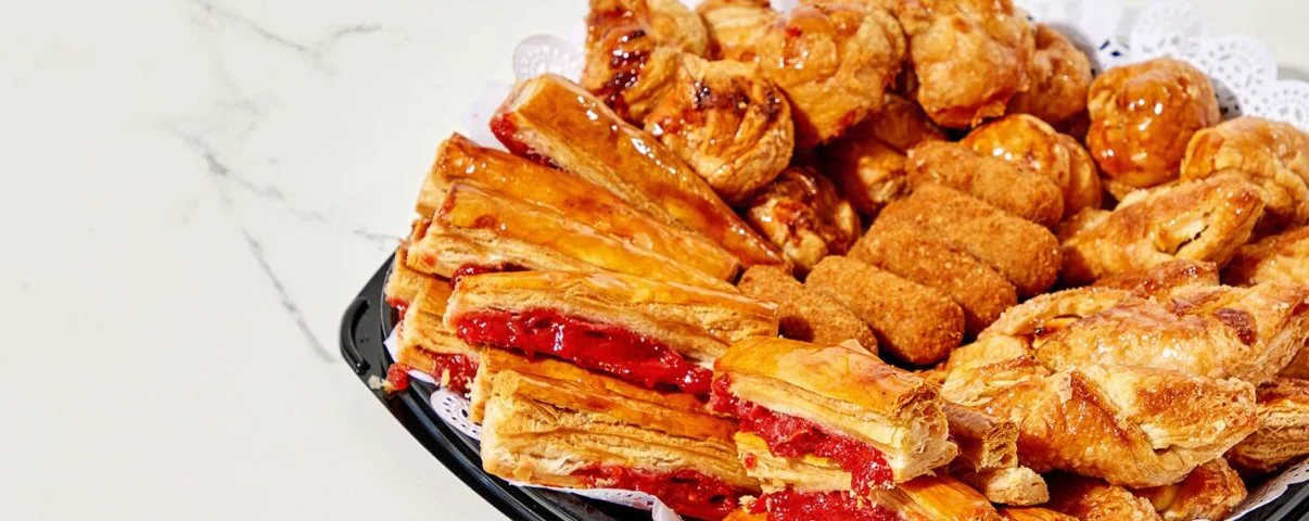 Assorted French pastries on a decorative platter