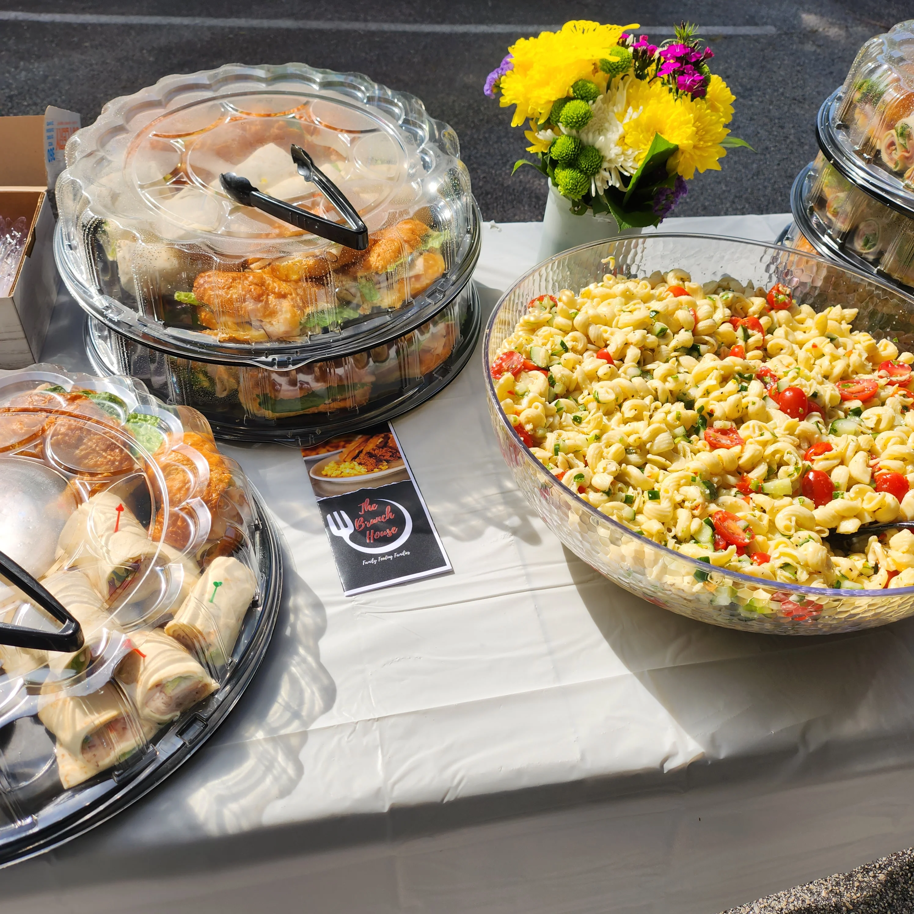Brunch House office catering with sandwiches, wraps, and pasta salad