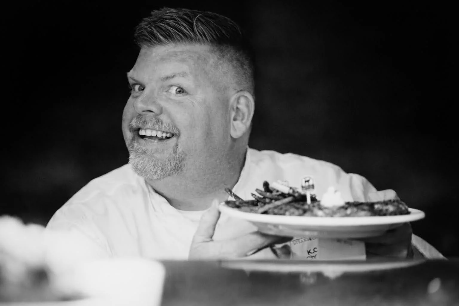 A restaurant chef preparing a dish