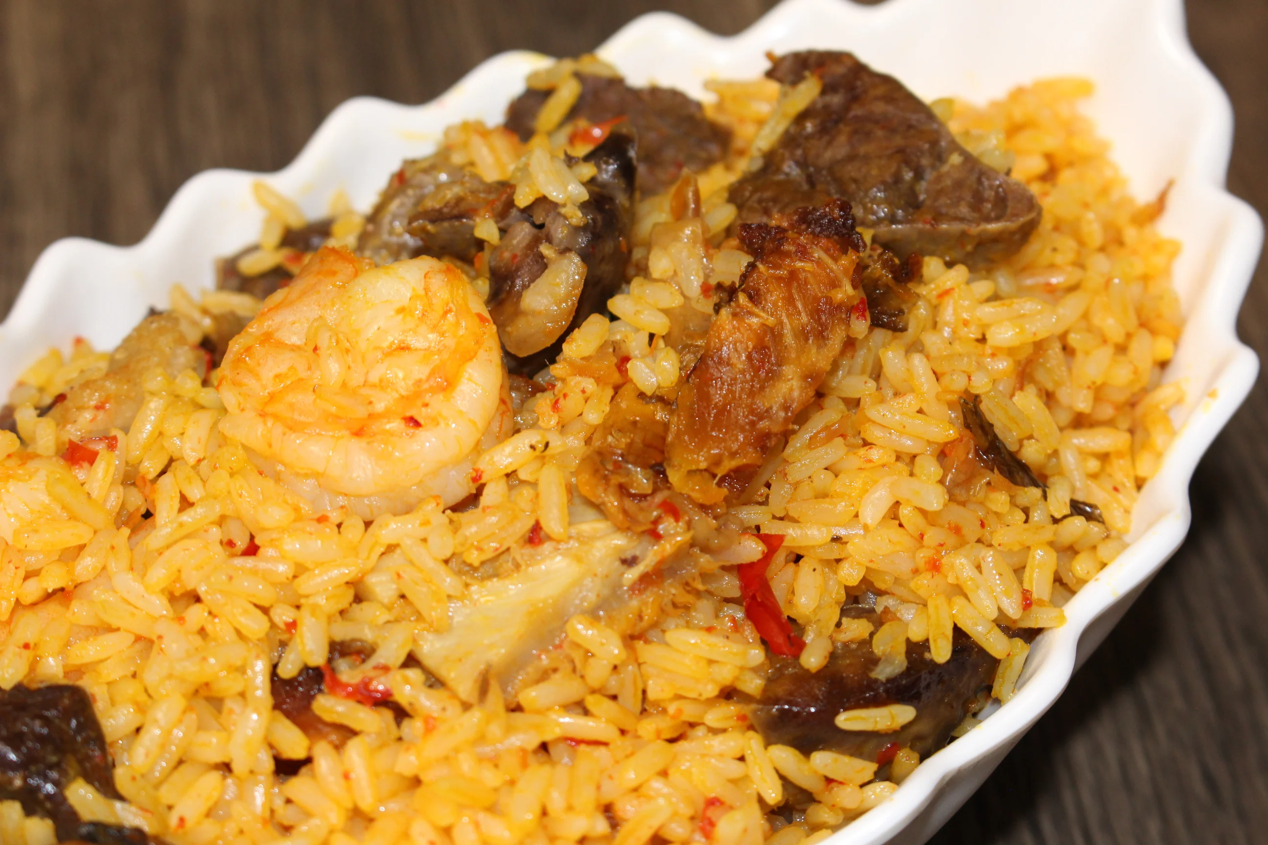 Nigerian jollof rice with shrimp and assorted meats
