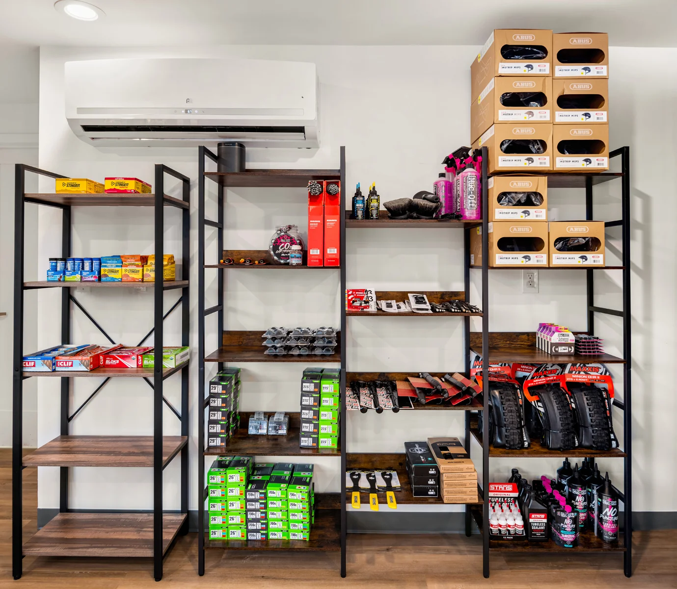 Retail display of snacks and cycling accessories on shelves