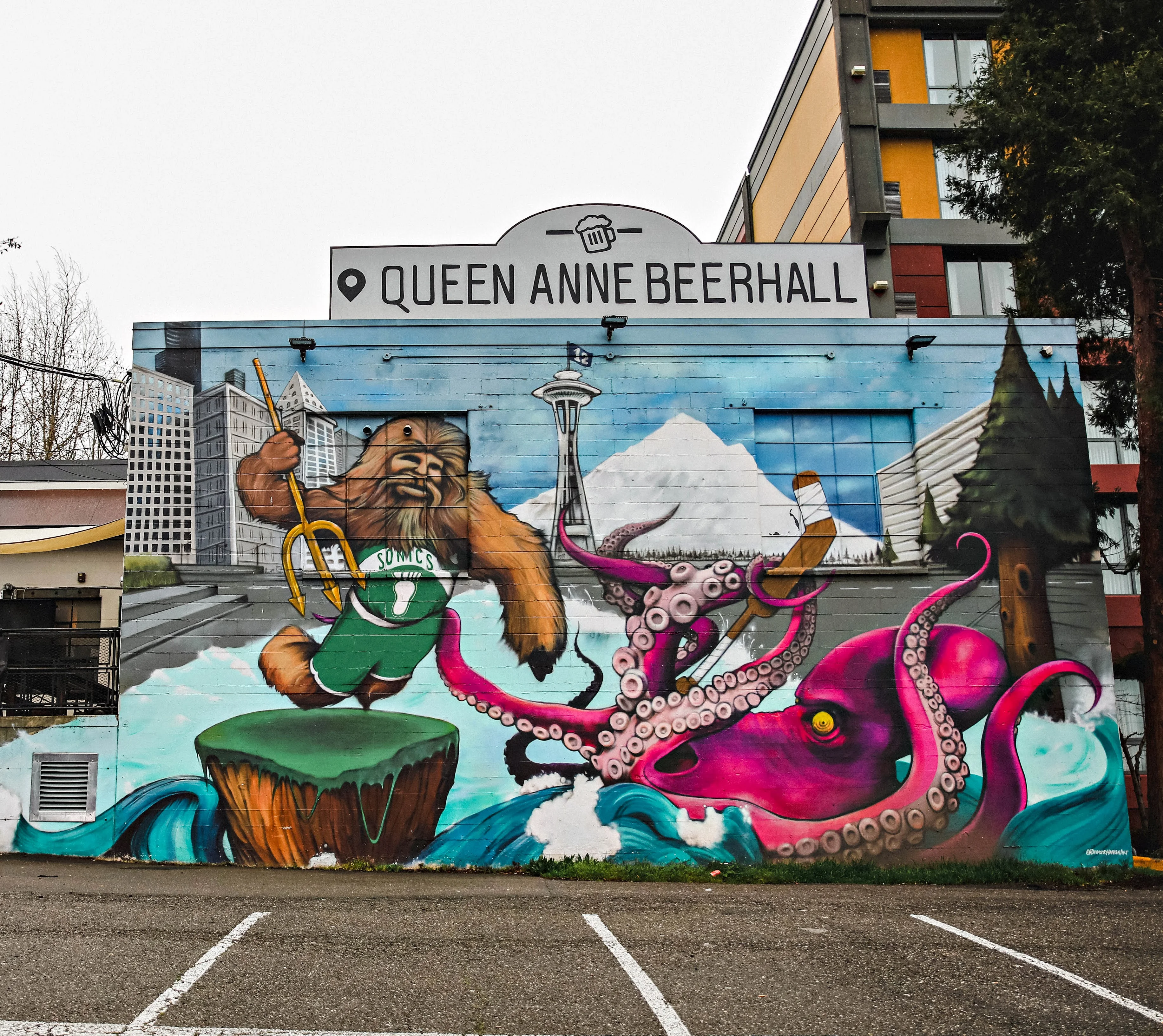 Colorful mural featuring a bear and octopus at Queen Anne Beerhall