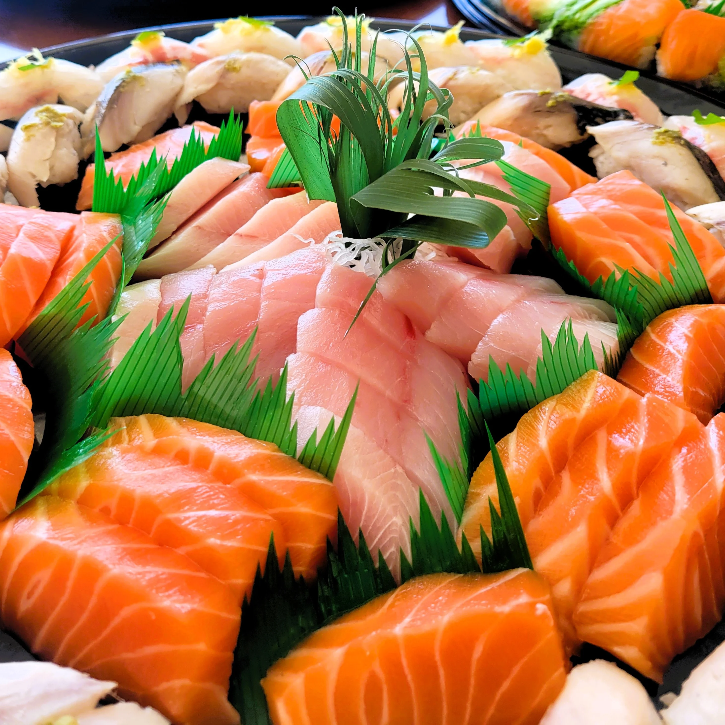 Indulge in premium cuts like Bluefin Otoro and Chutoro, plus our creative specialty rolls made with the freshest wild-caught fish available.