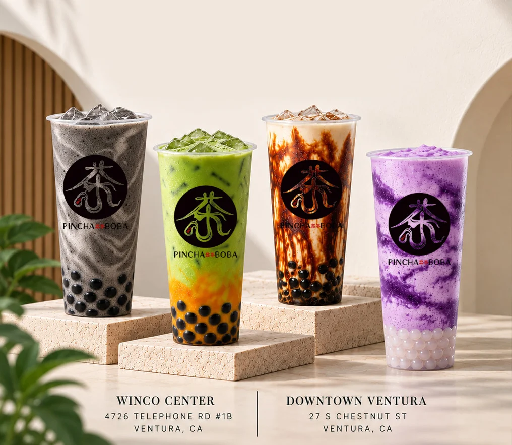 Colorful boba tea drinks in clear cups with tapioca pearls