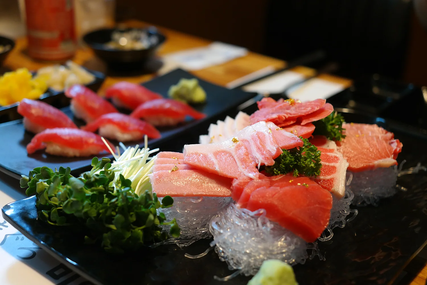 Assorted Japanese sashimi platter with fresh fish and garnishes