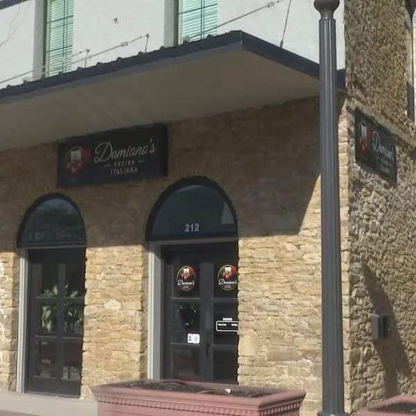 Exterior view of Damiana's Italian restaurant with stone facade