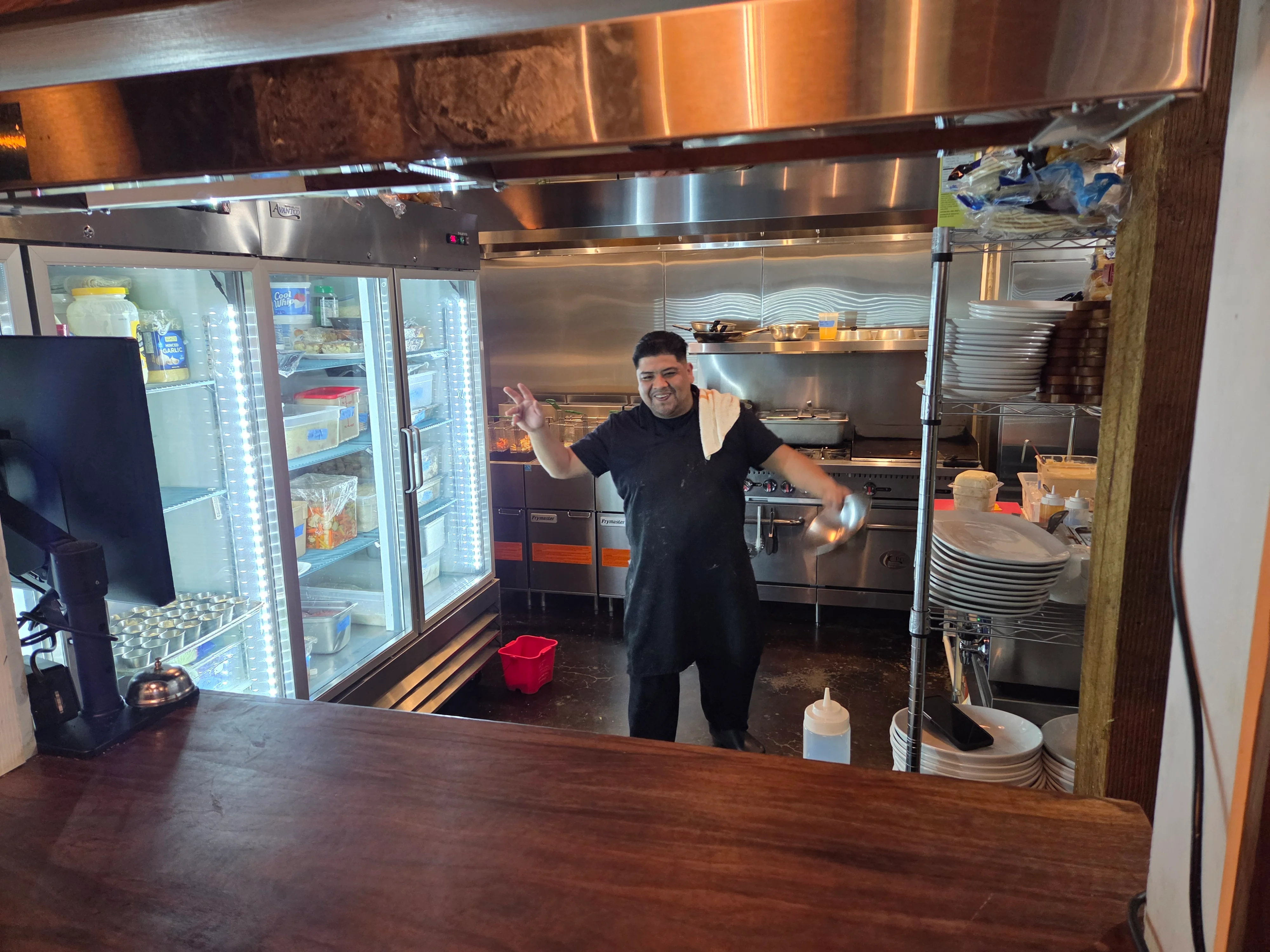 A restaurant chef preparing a dish