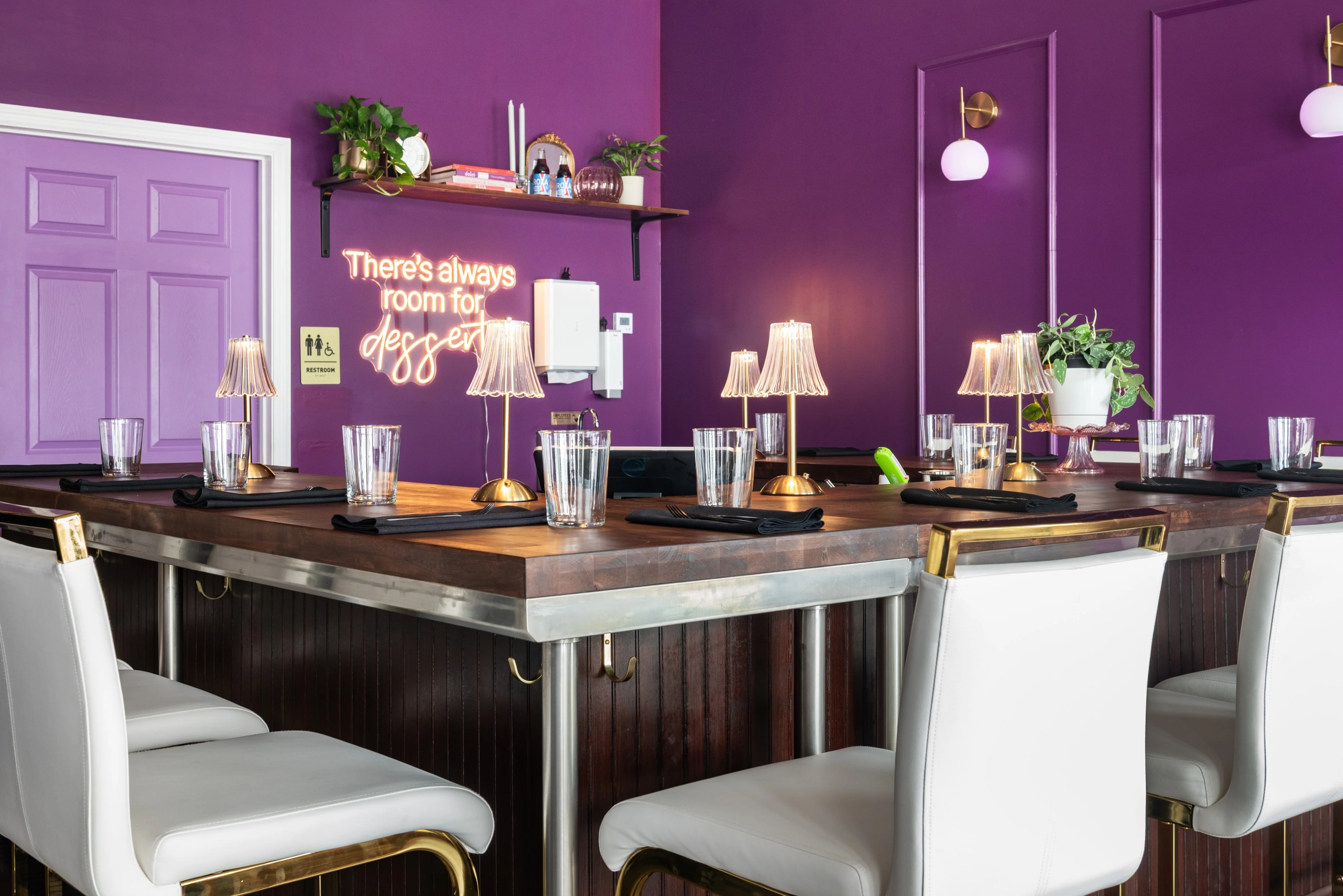 Interior view of a cozy restaurant with warm lighting and inviting decor.