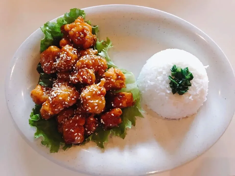 Crispy sesame chicken with steamed rice