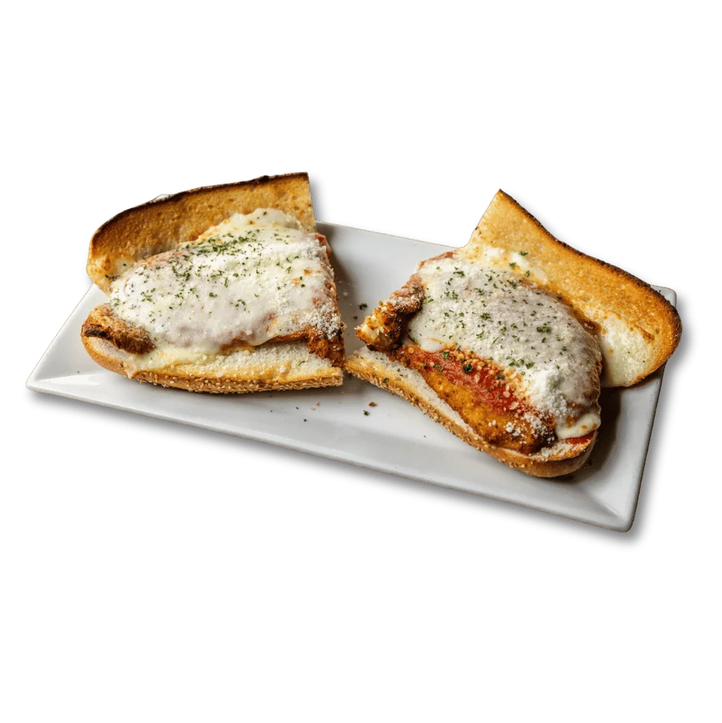 Delicious chicken parmesan served with pasta and garnished with herbs.