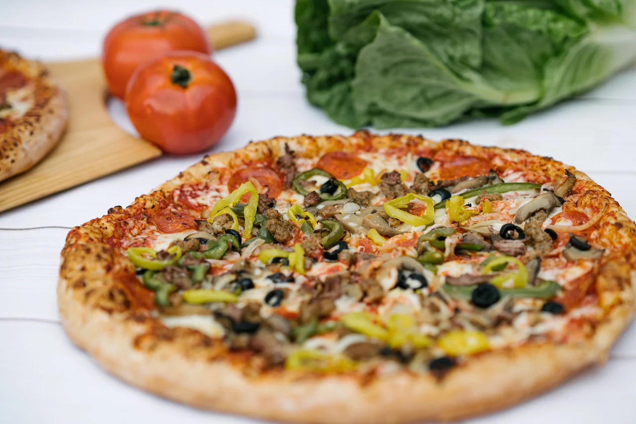 Loaded meat lover's pizza with fresh toppings