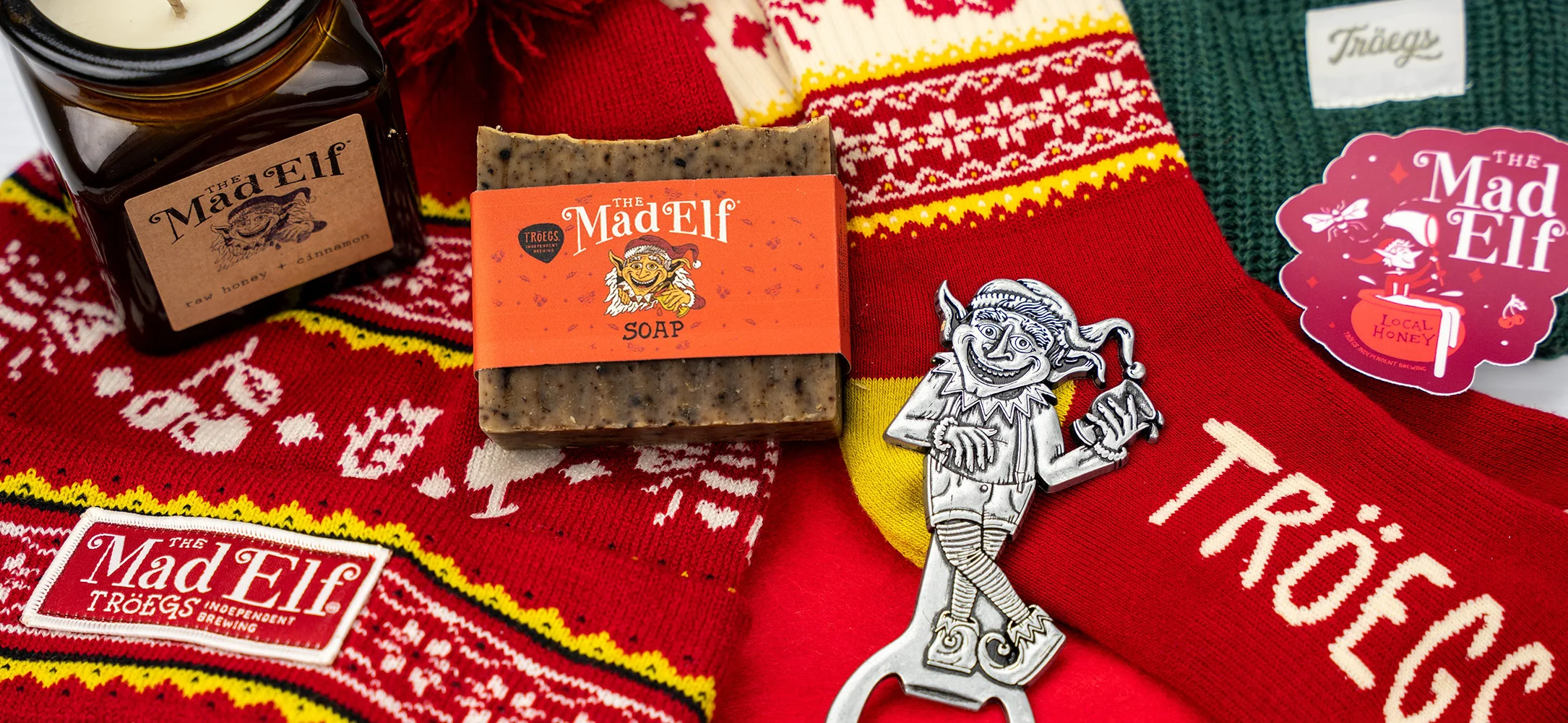 Mad Elf holiday gift set with craft beer, soap, socks, and bottle opener