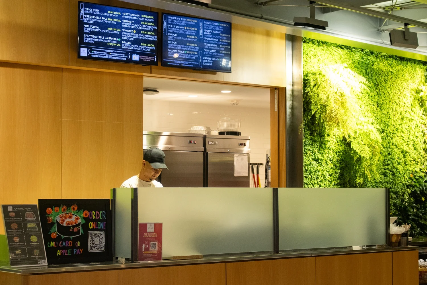 Modern sushi restaurant interior with digital menu