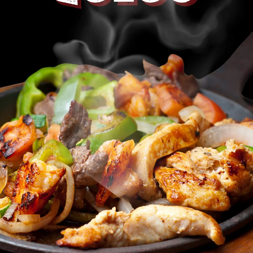 Sizzling fajitas with grilled chicken and vegetables