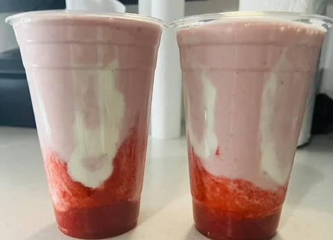 Strawberry milkshake with creamy layers