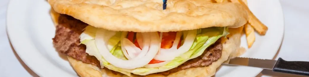 Delicious Lebanese kaak sandwich with beef and fresh vegetables