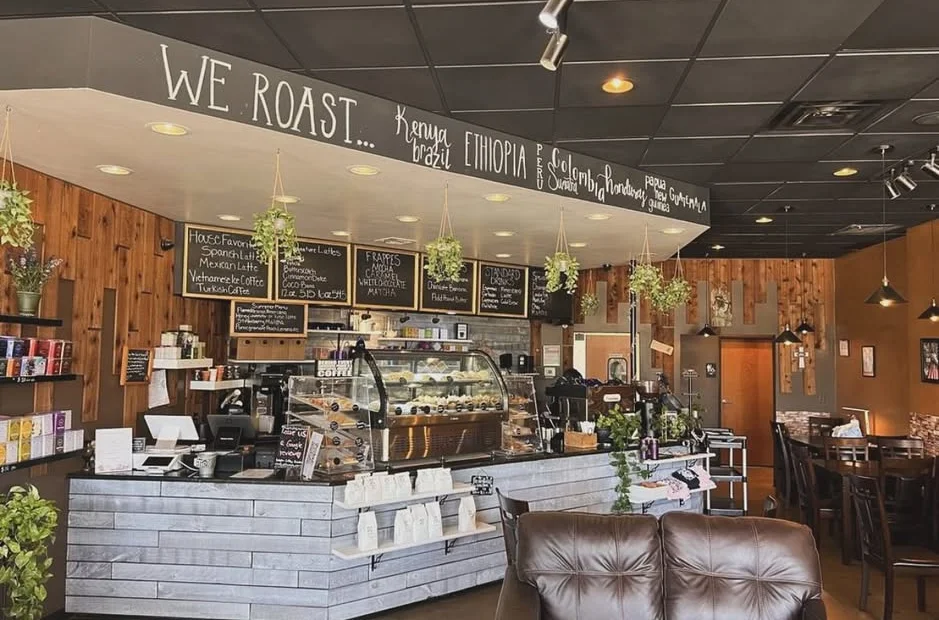 Cozy coffee shop interior with rustic decor and menu board