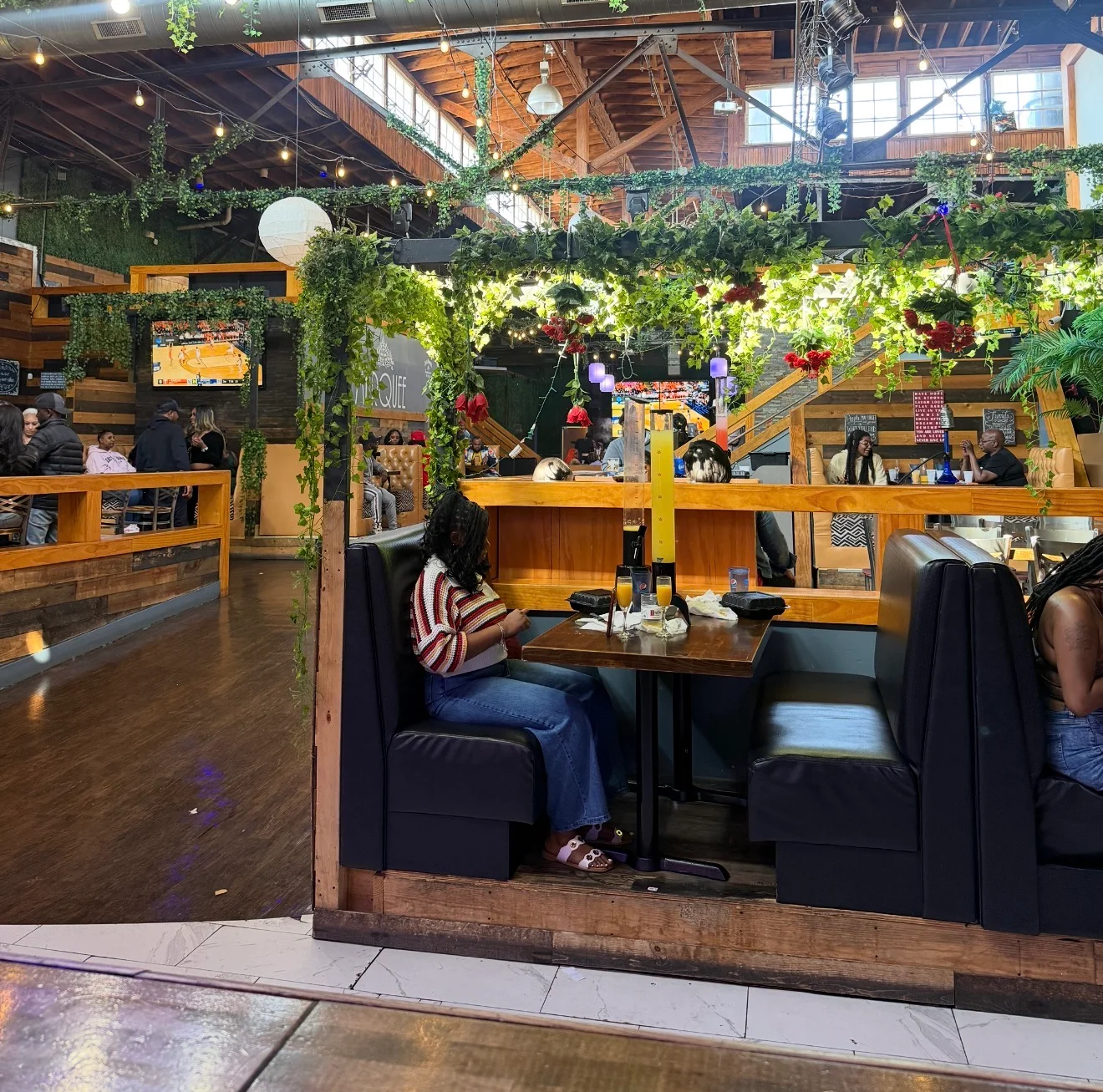Delicious gourmet burger with fresh toppings on a wooden table