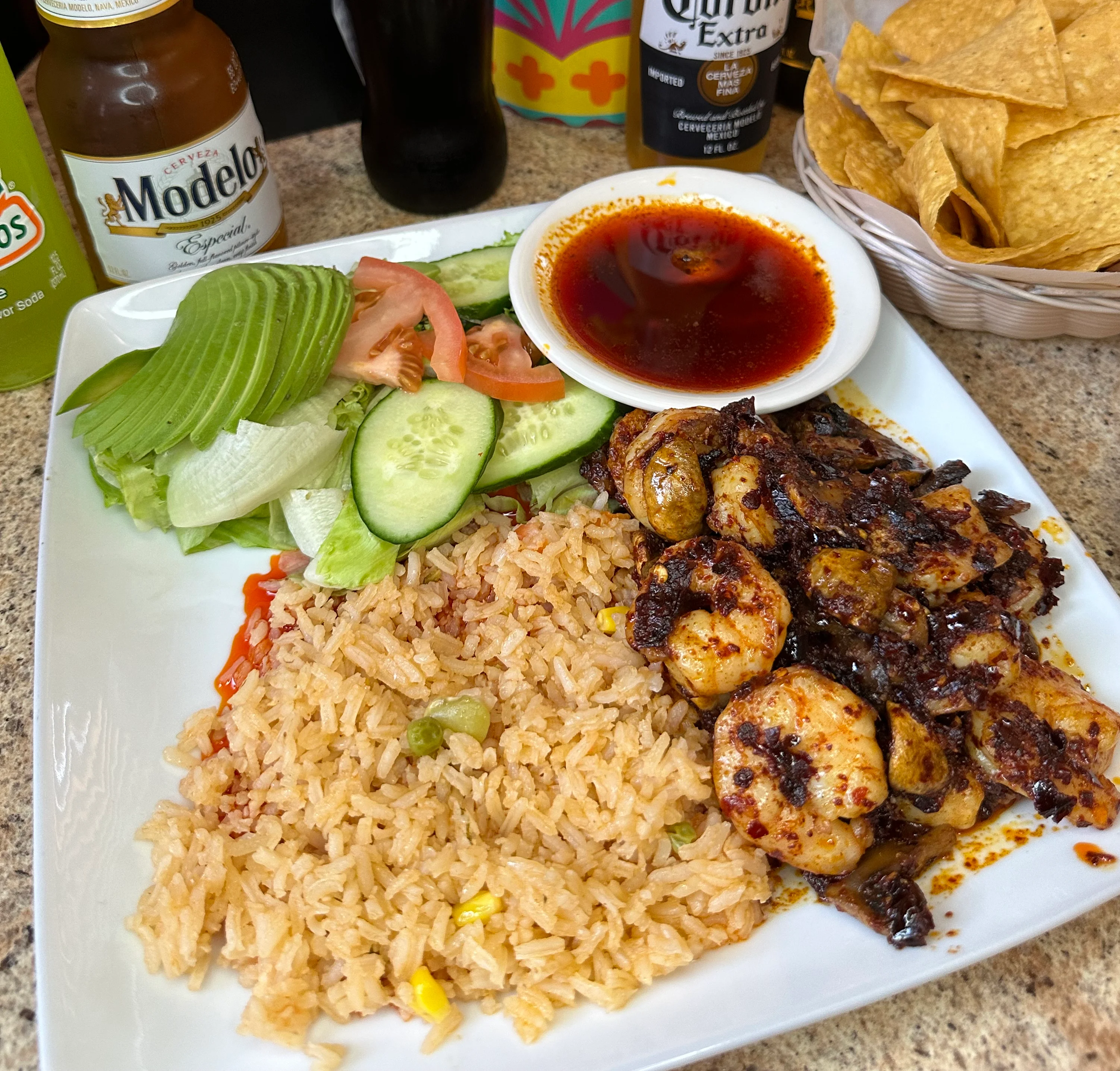Delicious Mexican shrimp fajitas with rice and fresh vegetables