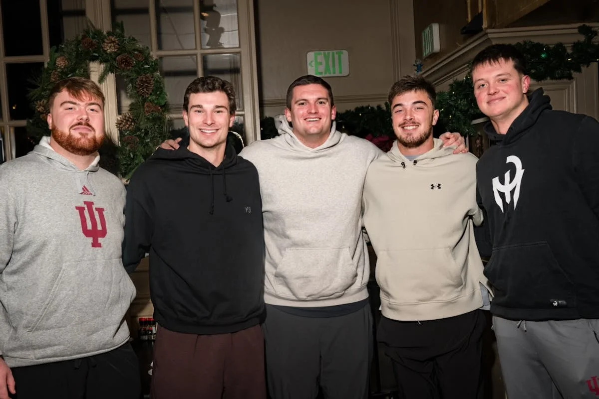 Group of friends posing together in a festive setting
