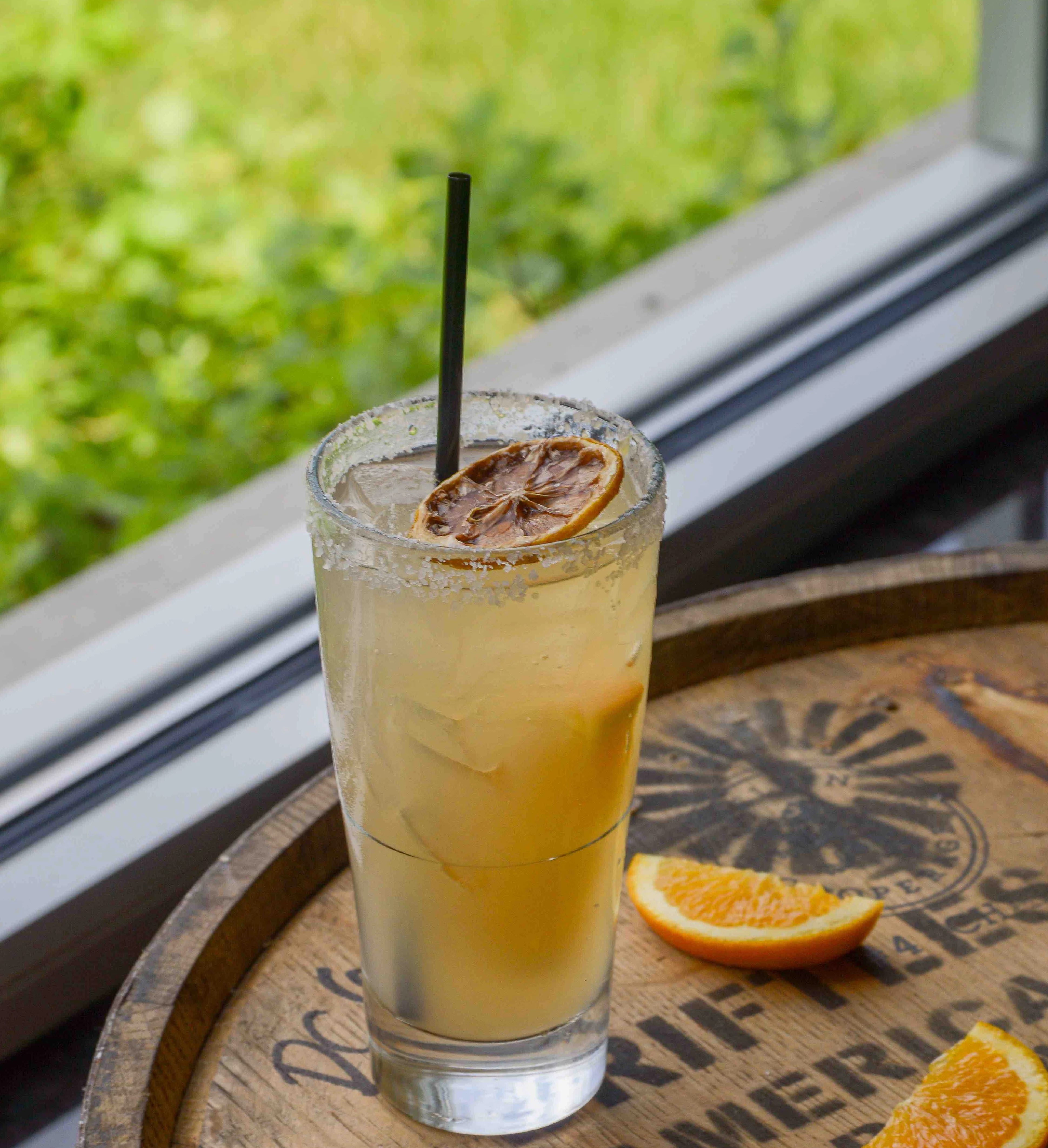 Salty Glen on a barrel with orange slices