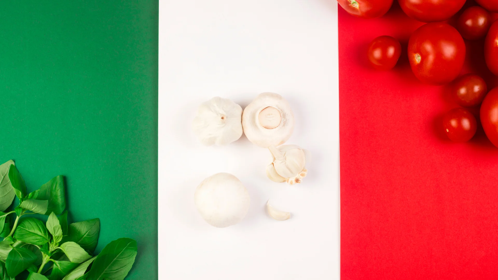 Italian flag colors with spinach, garlic, tomatoes around