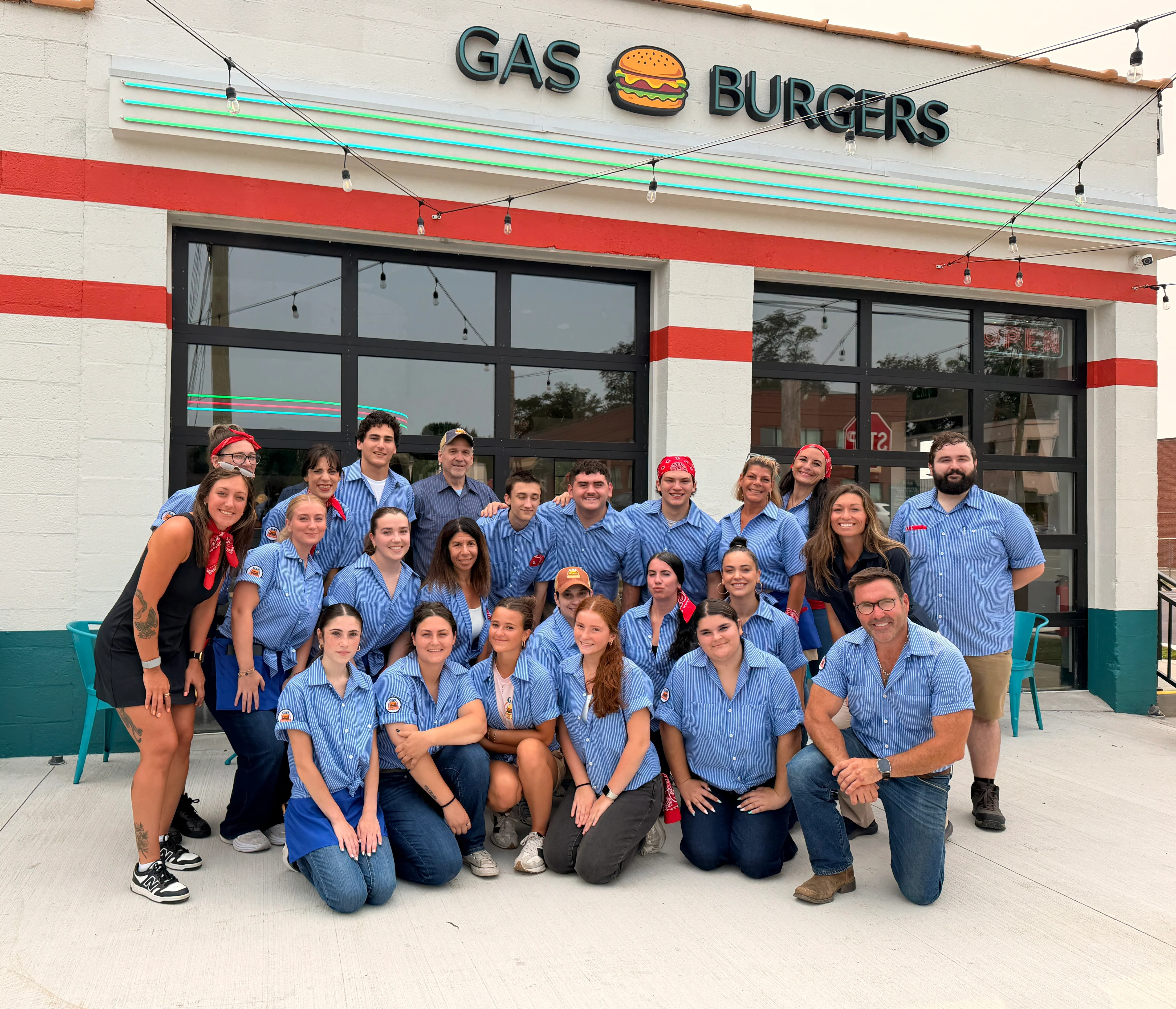 Team of staff in front of Gas Burgers restaurant